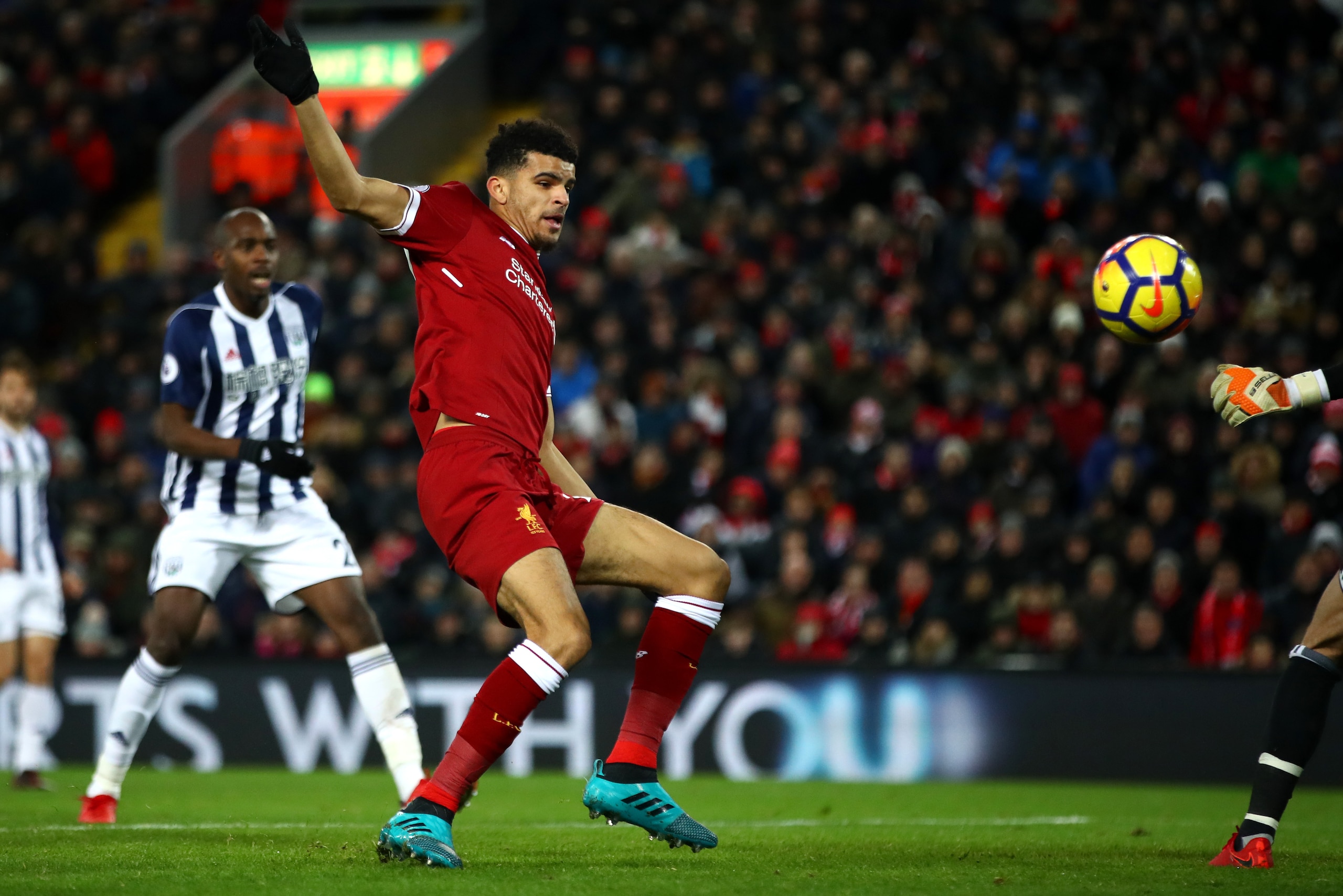 LIVERPOOL, ENGLAND - DECEMBER 13: Dominic Solanke of Liverpool scores but the goal is disallowed during the Premier League match between Liverpool and West Bromwich Albion at Anfield on December 13, 2017 in Liverpool, England.  (Photo by Clive Brunskill/G