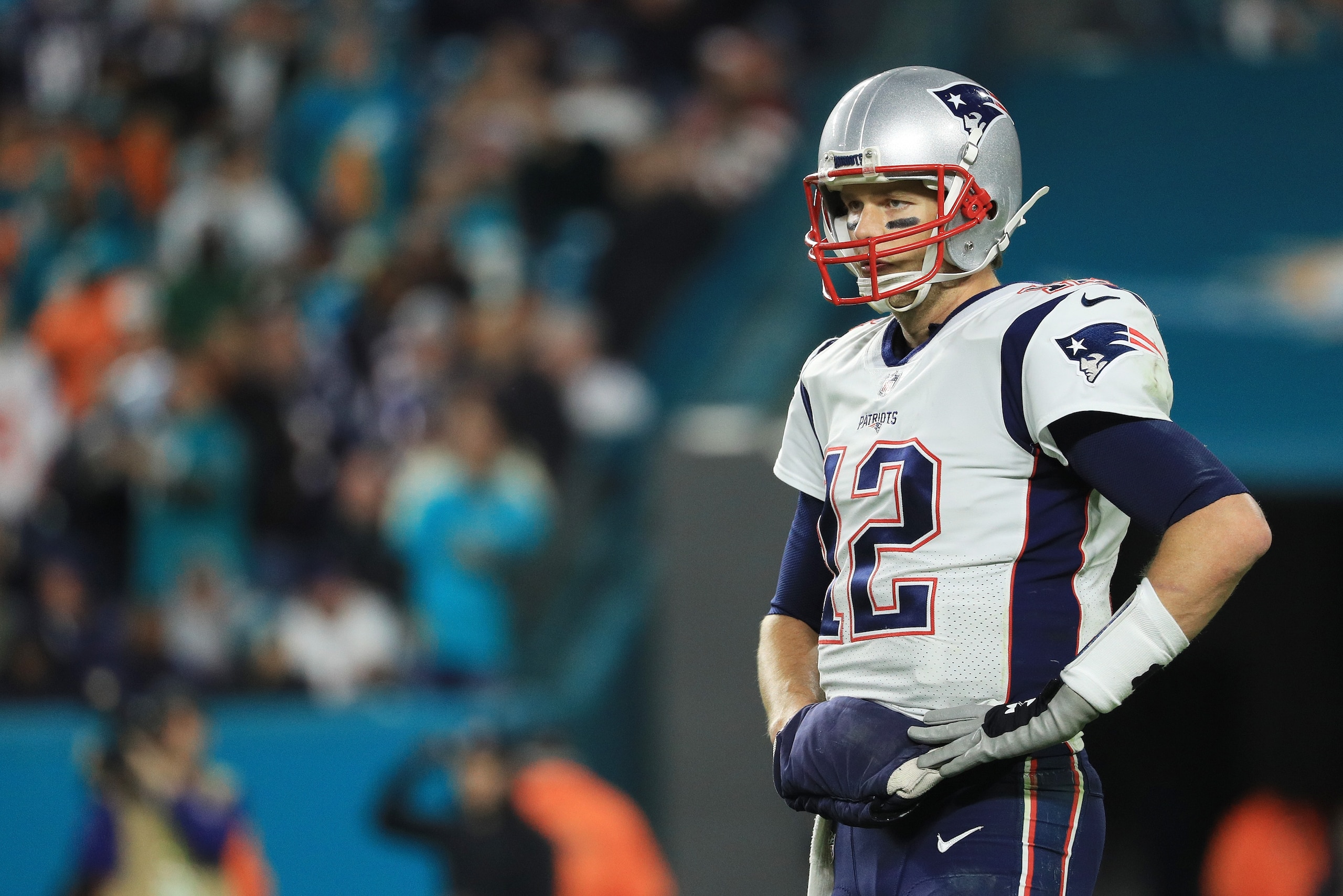 MIAMI GARDENS, FL - DECEMBER 11: Tom Brady #12 of the New England Patriots looks on in the third quarter against the Miami Dolphins at Hard Rock Stadium on December 11, 2017 in Miami Gardens, Florida. (Photo by Mike Ehrmann/Getty Images) MIAMI GARDENS, FL - DECEMBER 11: Tom Brady #12 of the New England Patriots looks on in the third quarter against the Miami Dolphins at Hard Rock Stadium on December 11, 2017 in Miami Gardens, Florida. (Photo by Mike Ehrmann/Getty Images)