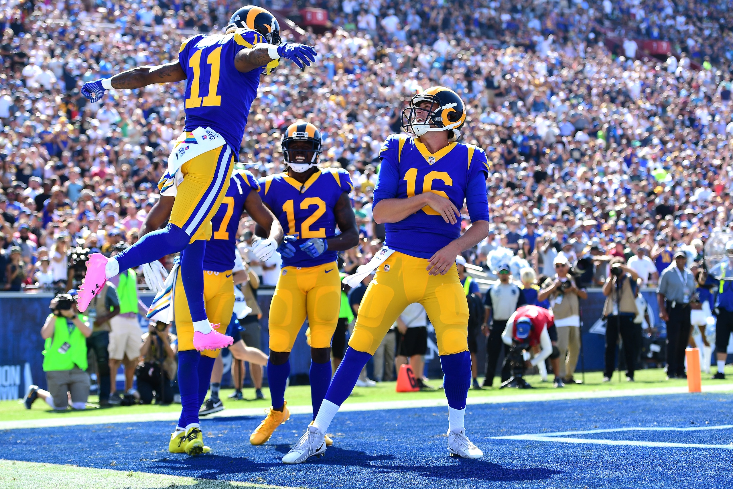 LOS ANGELES, CA - OCTOBER 08:  Tavon Austin #11, Sammy Watkins #12 and Jared Goff #16 of the Los Angeles Rams celebrate after scoring a touchdown during the game against the Seattle Seahawks at Los Angeles Memorial Coliseum on October 8, 2017 in Los Angel