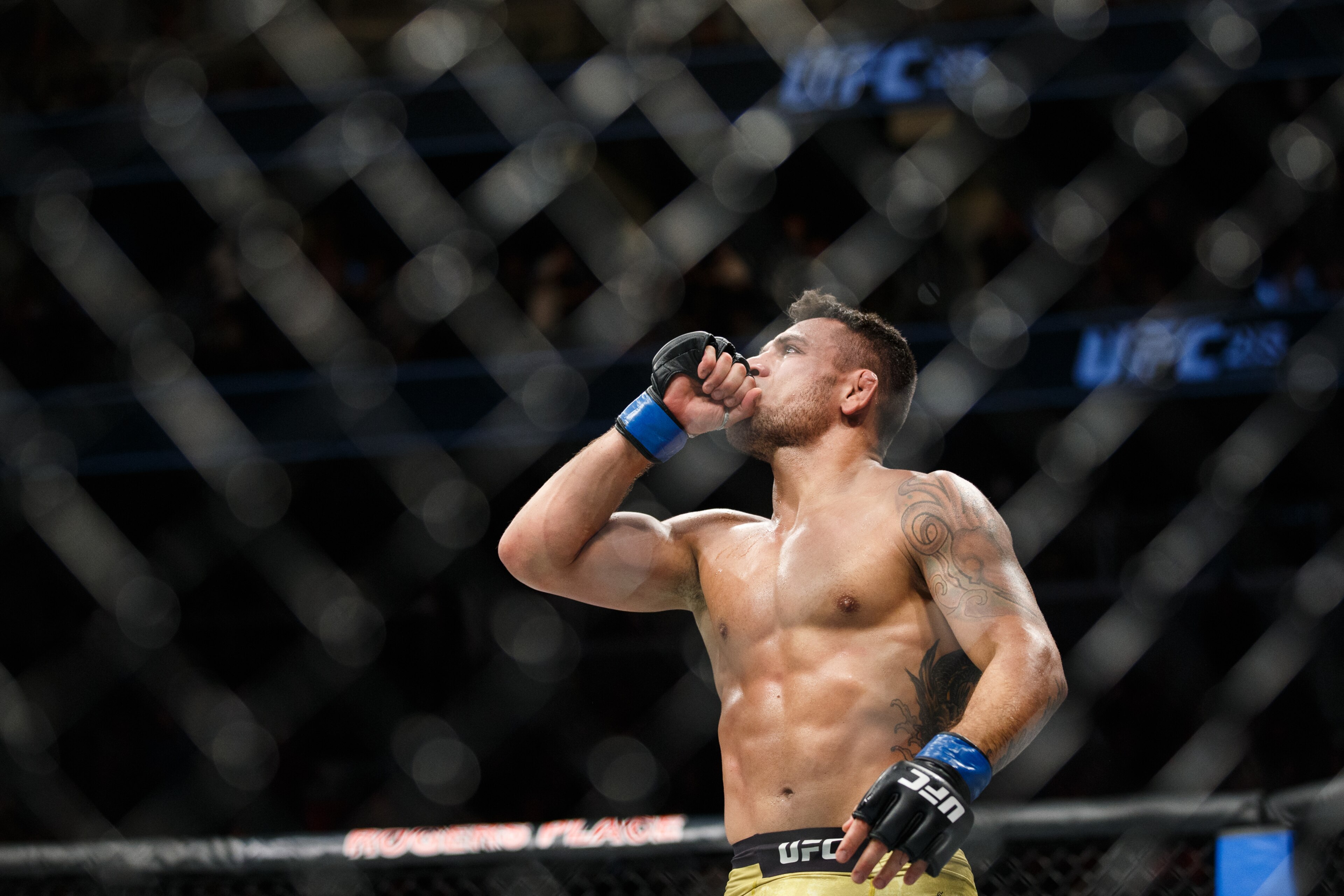 EDMONTON, AB - SEPTEMBER 09:  Rafael Dos Anjos celebrates his victory over Neil Magny during UFC 215 at Rogers Place on September 9, 2017 in Edmonton, Canada. (Photo by Codie McLachlan/Getty Images)