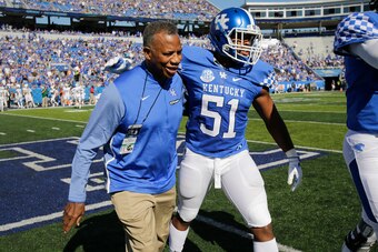 Love heads off the field after a win versus Eastern Michigan earlier this year.