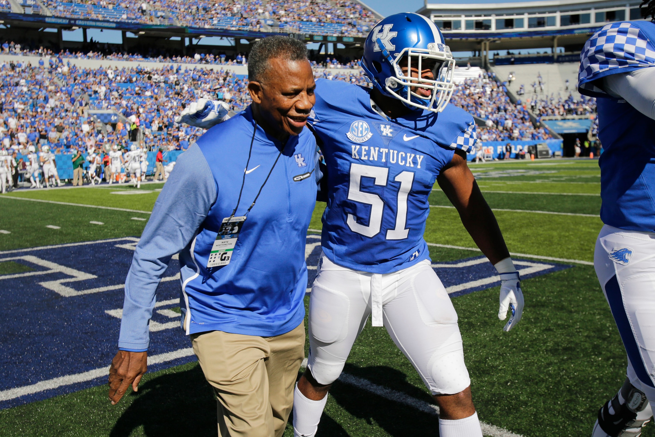Love heads off the field after a win versus Eastern Michigan earlier this year.