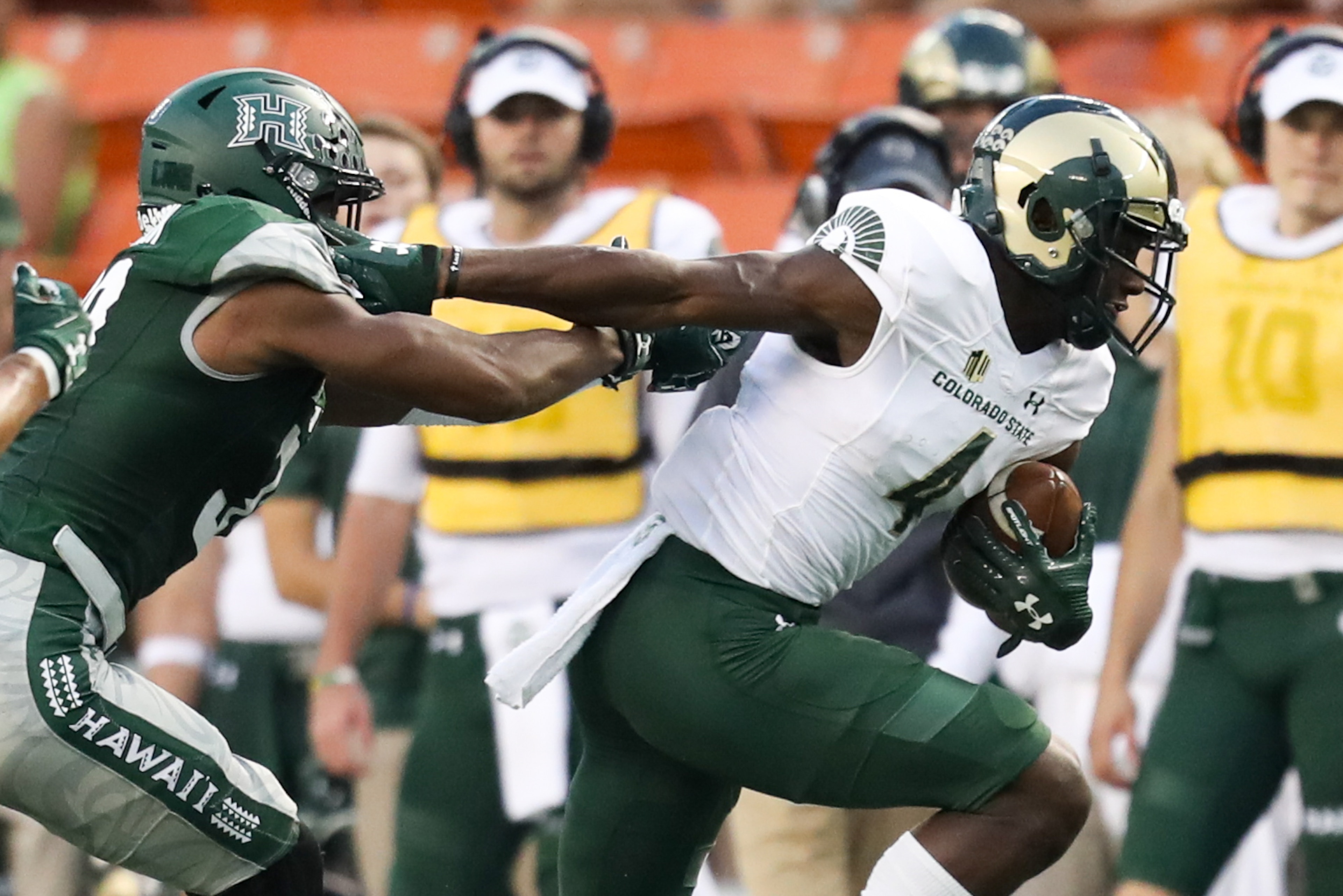 HONOLULU, HI - SEPTEMBER 30: Michael Gallup #4 of the Colorado State Rams breaks a tackle after making a catch during the first half of the NCAA football game between the Colorado State Rams and the Hawaii Rainbow Warriors at Aloha Stadium on September 30