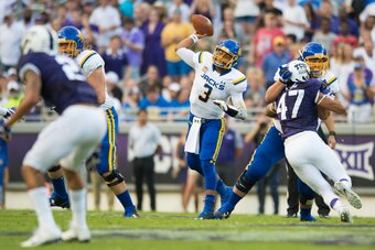 FORT WORTH, TX - SEPTEMBER 3:  Taryn Christion #3 of the South Dakota State Jackrabbits drops back to pass against the TCU Horned Frogs during the first half on September 3, 2016 at Amon G. Carter Stadium in Fort Worth, Texas.  (Photo by Cooper Neill/Gett