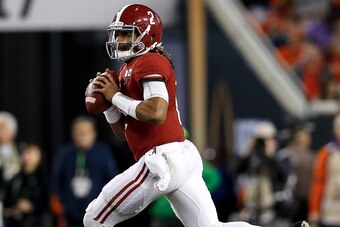 TAMPA, FL - JANUARY 09: Quarterback Jalen Hurts #2 of the Alabama Crimson Tide on a pass play during the 2017 College Football Playoff National Championship Game against the Clemson Tigers at Raymond James Stadium on January 9, 2017 in Tampa, Florida. The