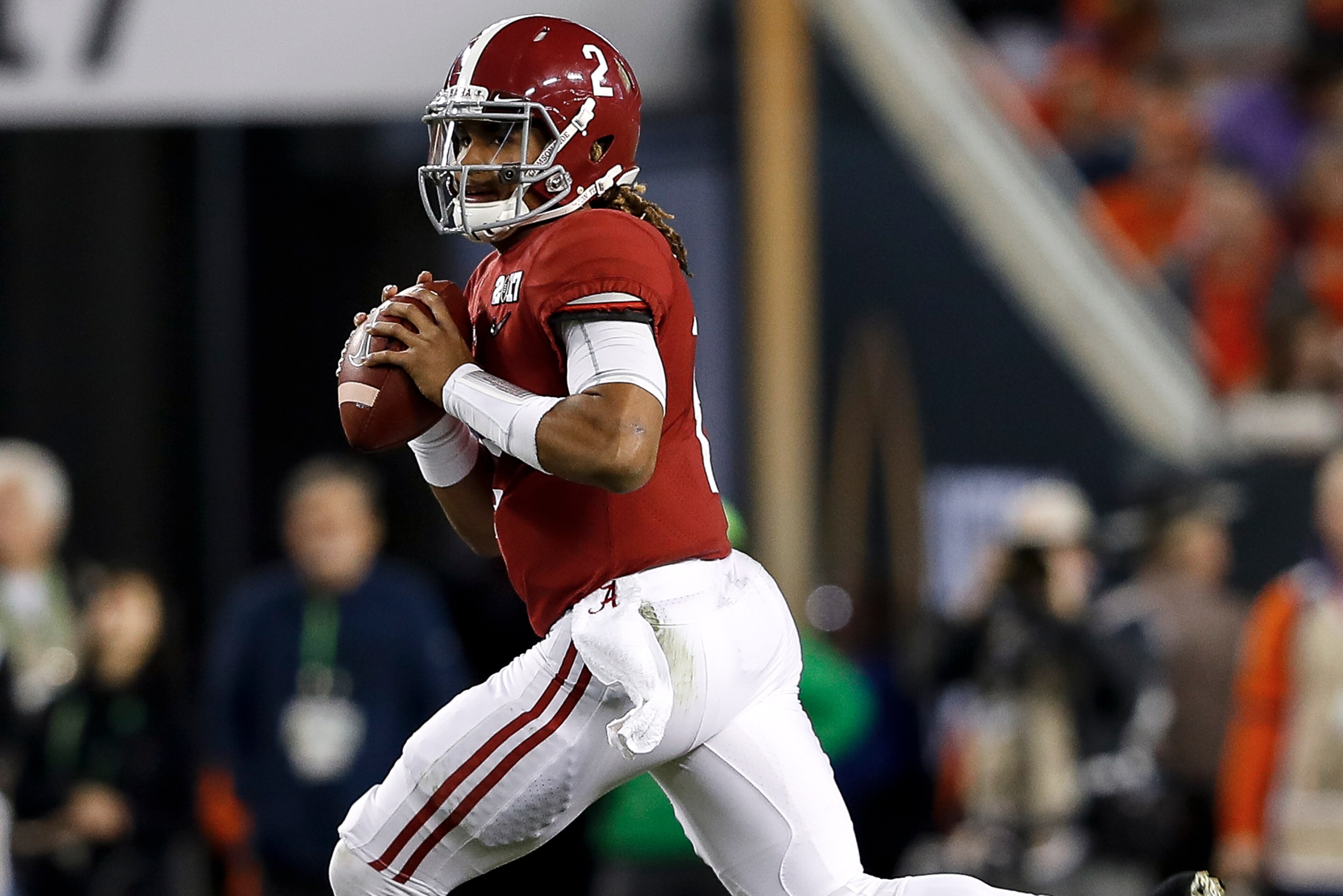 TAMPA, FL - JANUARY 09: Quarterback Jalen Hurts #2 of the Alabama Crimson Tide on a pass play during the 2017 College Football Playoff National Championship Game against the Clemson Tigers at Raymond James Stadium on January 9, 2017 in Tampa, Florida. The TAMPA, FL - JANUARY 09: Quarterback Jalen Hurts #2 of the Alabama Crimson Tide on a pass play during the 2017 College Football Playoff National Championship Game against the Clemson Tigers at Raymond James Stadium on January 9, 2017 in Tampa, Florida. The
