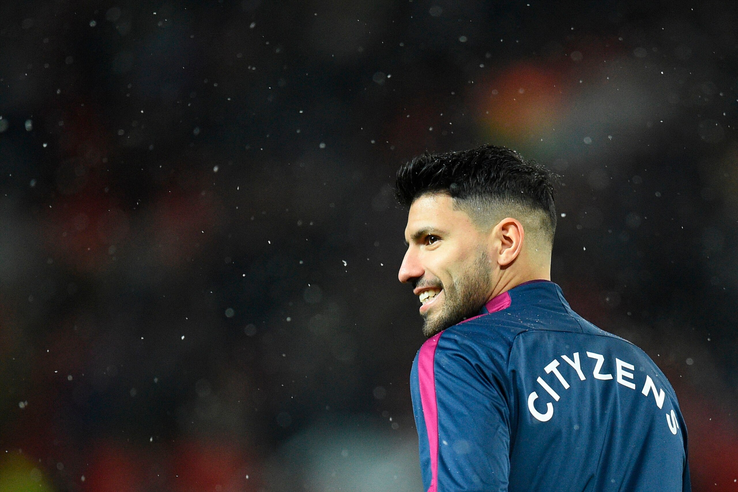 Manchester City's Argentinian striker Sergio Aguero warms up for the English Premier League football match between Manchester United and Manchester City at Old Trafford in Manchester, north west England, on December 10, 2017. / AFP PHOTO / Oli SCARFF / RE