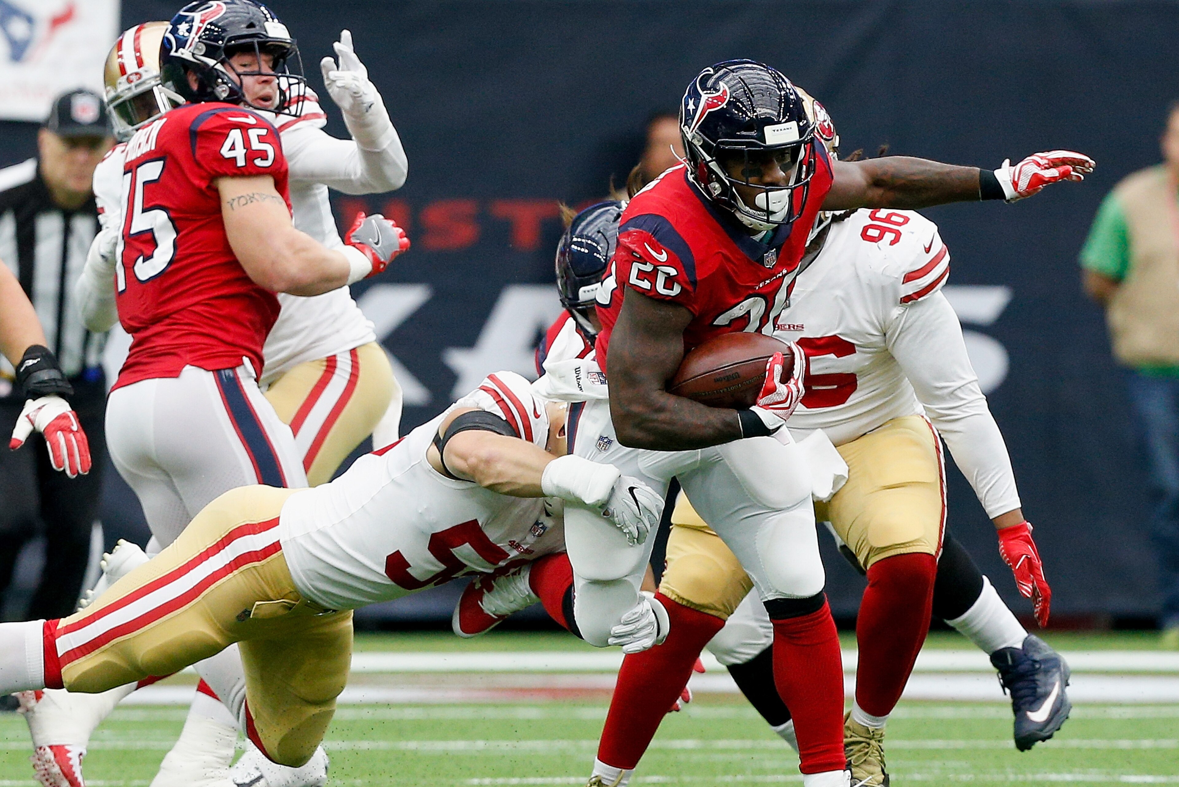HOUSTON, TX - DECEMBER 10: Lamar Miller #26 of the Houston Texans rushes past the San Francisco 49ers at NRG Stadium on December 10, 2017 in Houston, Texas.  (Photo by Bob Levey/Getty Images)