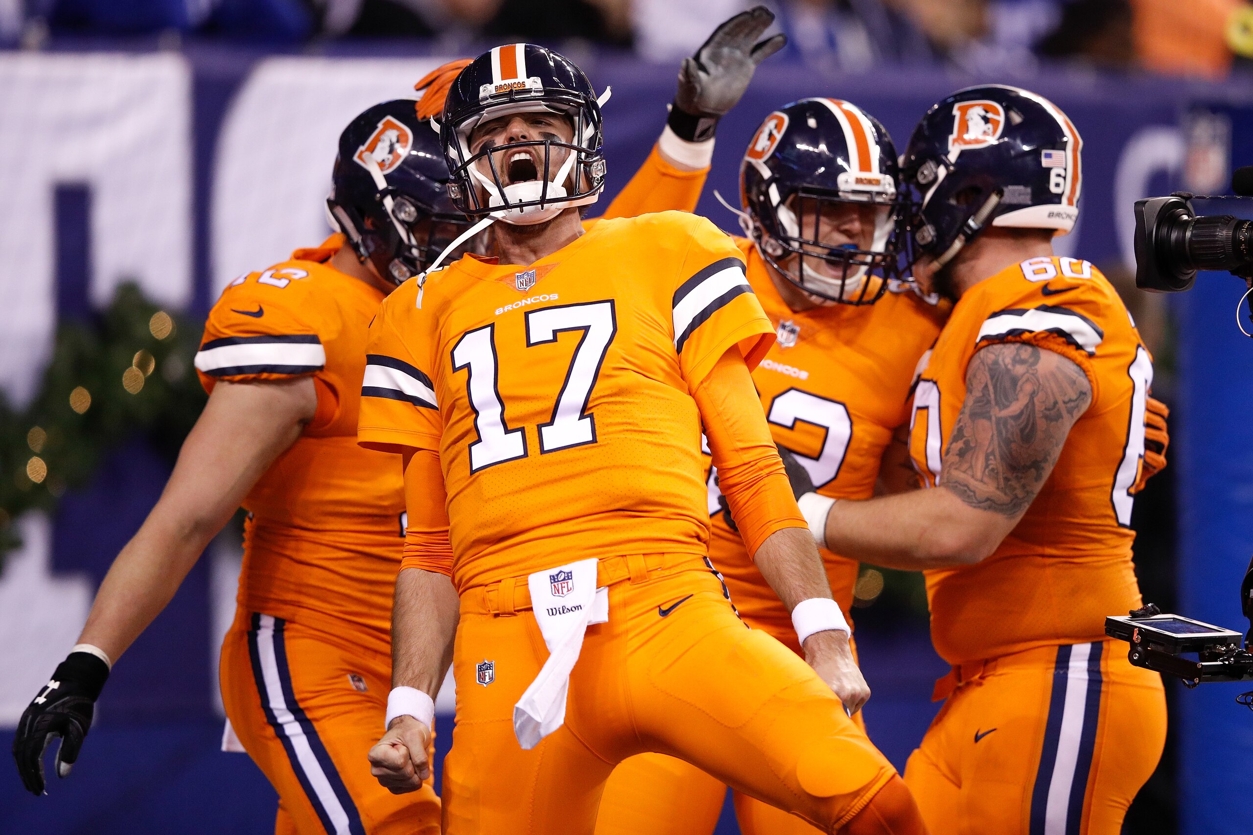 INDIANAPOLIS, IN - DECEMBER 14: Brock Osweiler #17 of the Denver Broncos celebrates with teammates after a touchdown against the Indianapolis Colts during the second half at Lucas Oil Stadium on December 14, 2017 in Indianapolis, Indiana. (Photo by Joe INDIANAPOLIS, IN - DECEMBER 14: Brock Osweiler #17 of the Denver Broncos celebrates with teammates after a touchdown against the Indianapolis Colts during the second half at Lucas Oil Stadium on December 14, 2017 in Indianapolis, Indiana. (Photo by Joe