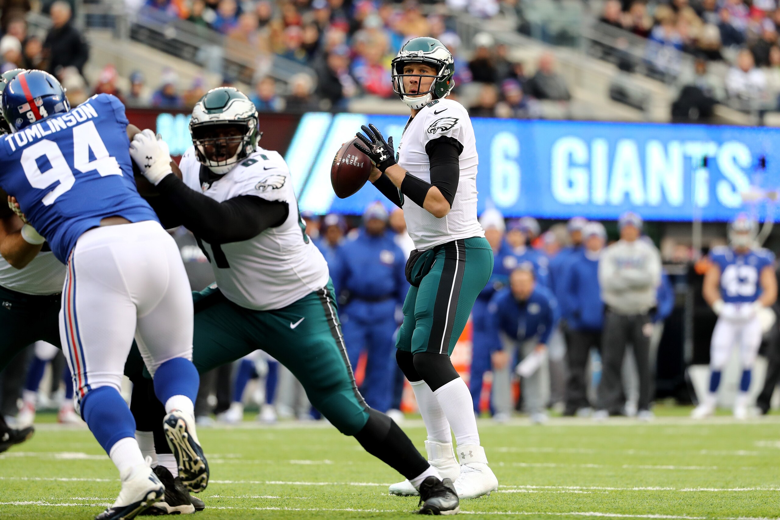 EAST RUTHERFORD, NJ - DECEMBER 17:  Nick Foles #9 of the Philadelphia Eagles looks to throw a pass against the New York Giants during the first quarter in the game at MetLife Stadium on December 17, 2017 in East Rutherford, New Jersey.  (Photo by Elsa/Get