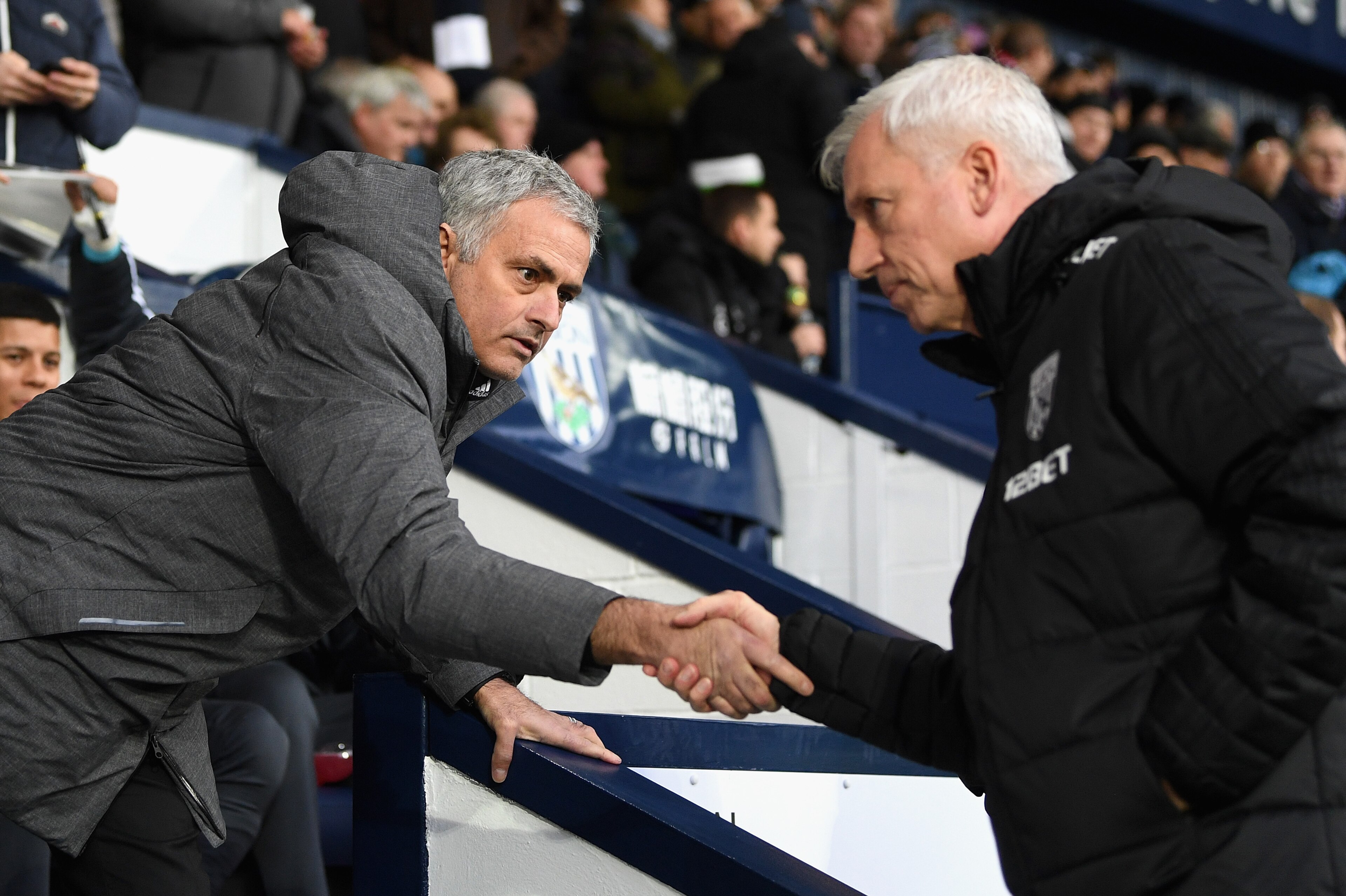 WEST BROMWICH, ENGLAND - DECEMBER 17: Jose Mourinho, Manager of Manchester United and Alan Pardew, Manager of West Bromwich Albion greet each other prior to the Premier League match between West Bromwich Albion and Manchester United at The Hawthorns on D WEST BROMWICH, ENGLAND - DECEMBER 17: Jose Mourinho, Manager of Manchester United and Alan Pardew, Manager of West Bromwich Albion greet each other prior to the Premier League match between West Bromwich Albion and Manchester United at The Hawthorns on D