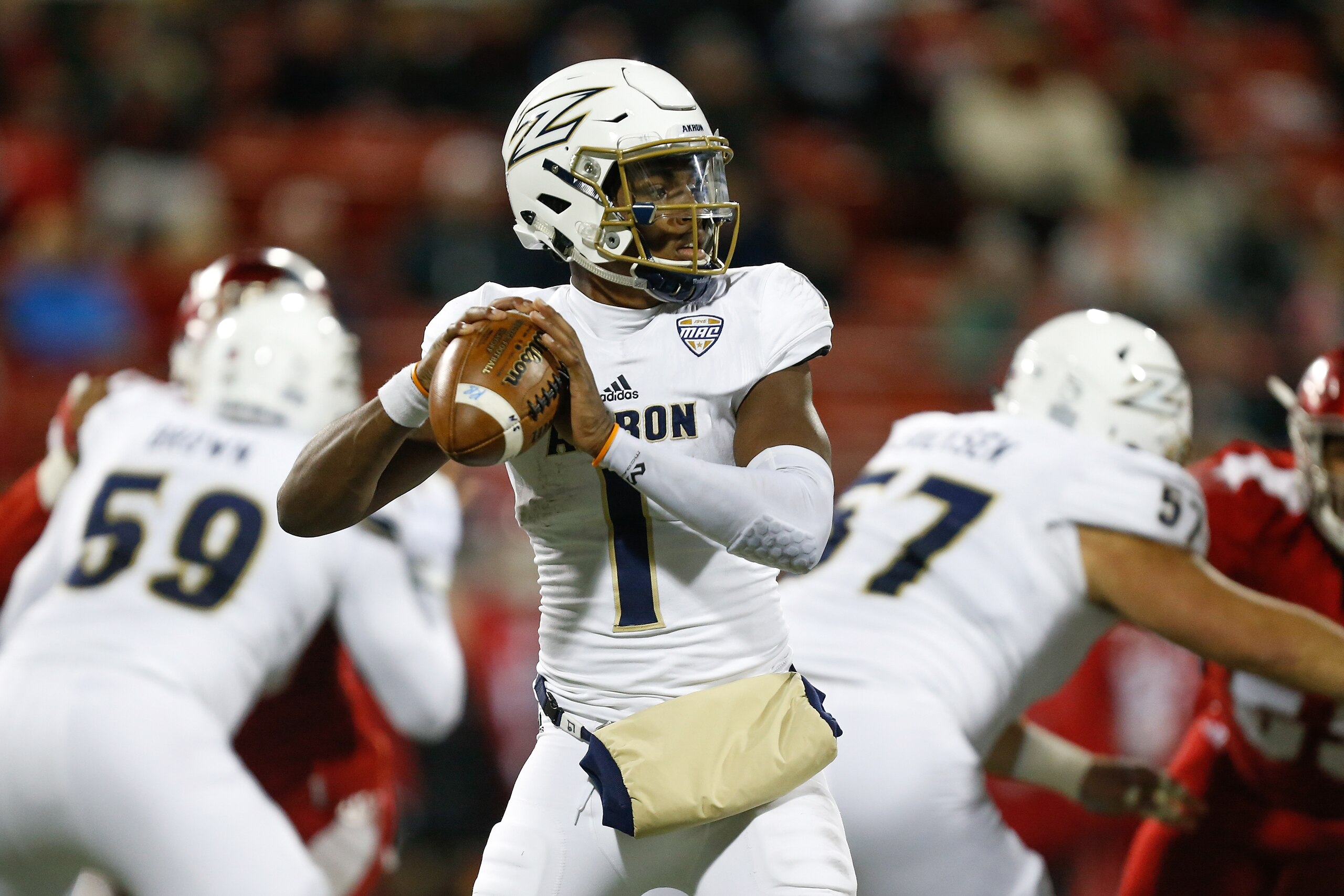 OXFORD, OH - NOVEMBER 07: Kato Nelson #1 of the Akron Zips looks to pass against the Miami Ohio Redhawks during the first half at Yager Stadium on November 7, 2017 in Oxford, Ohio. (Photo by Michael Reaves/Getty Images) OXFORD, OH - NOVEMBER 07: Kato Nelson #1 of the Akron Zips looks to pass against the Miami Ohio Redhawks during the first half at Yager Stadium on November 7, 2017 in Oxford, Ohio. (Photo by Michael Reaves/Getty Images)