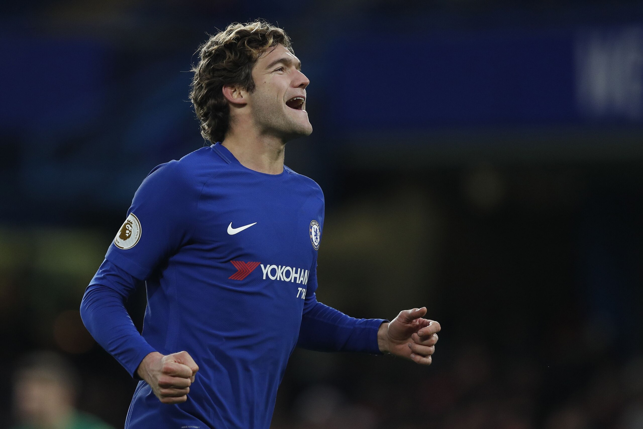 Chelsea's Spanish defender Marcos Alonso celebrates after scoring during the English Premier League football match between Chelsea and Southampton at Stamford Bridge in London on December 16, 2017. / AFP PHOTO / Adrian DENNIS / RESTRICTED TO EDITORIAL USE