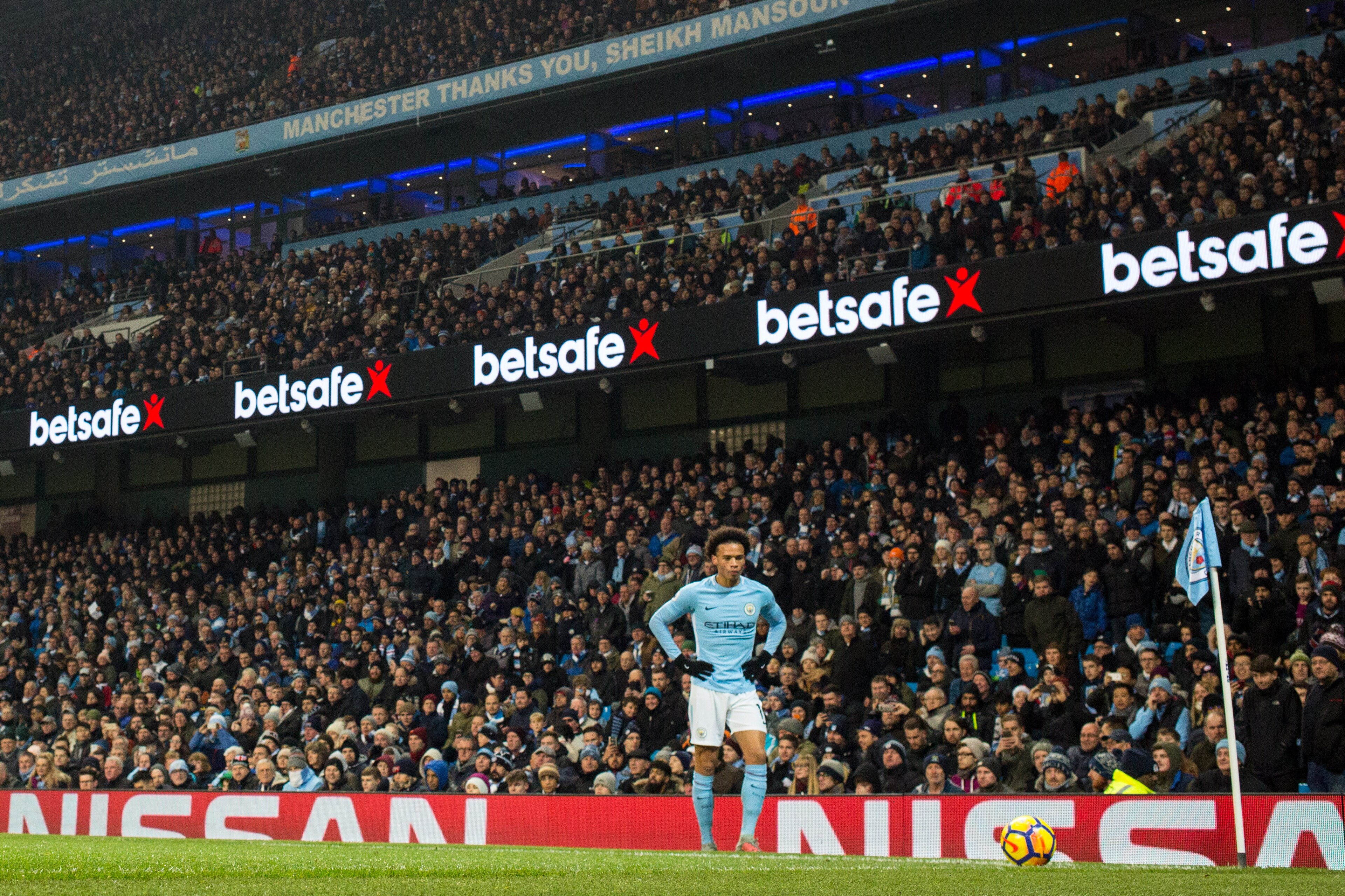 MANCHESTER, ENGLAND - DECEMBER 16: Leroy Sane of Manchester City takes a comer during the Premier League match between Manchester City and Tottenham Hotspur at Etihad Stadium on December 16, 2017 in Manchester, England. (Photo by Robbie Jay Barratt - AMA/