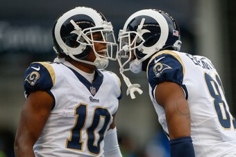 SEATTLE, WA - DECEMBER 17:  Punt returner Pharoh Cooper #10 of the Los Angeles Rams is congratulated by Gerald Everett #81 after making a 53 yard return against the Seattle Seahawks at CenturyLink Field on December 17, 2017 in Seattle, Washington.  (Photo
