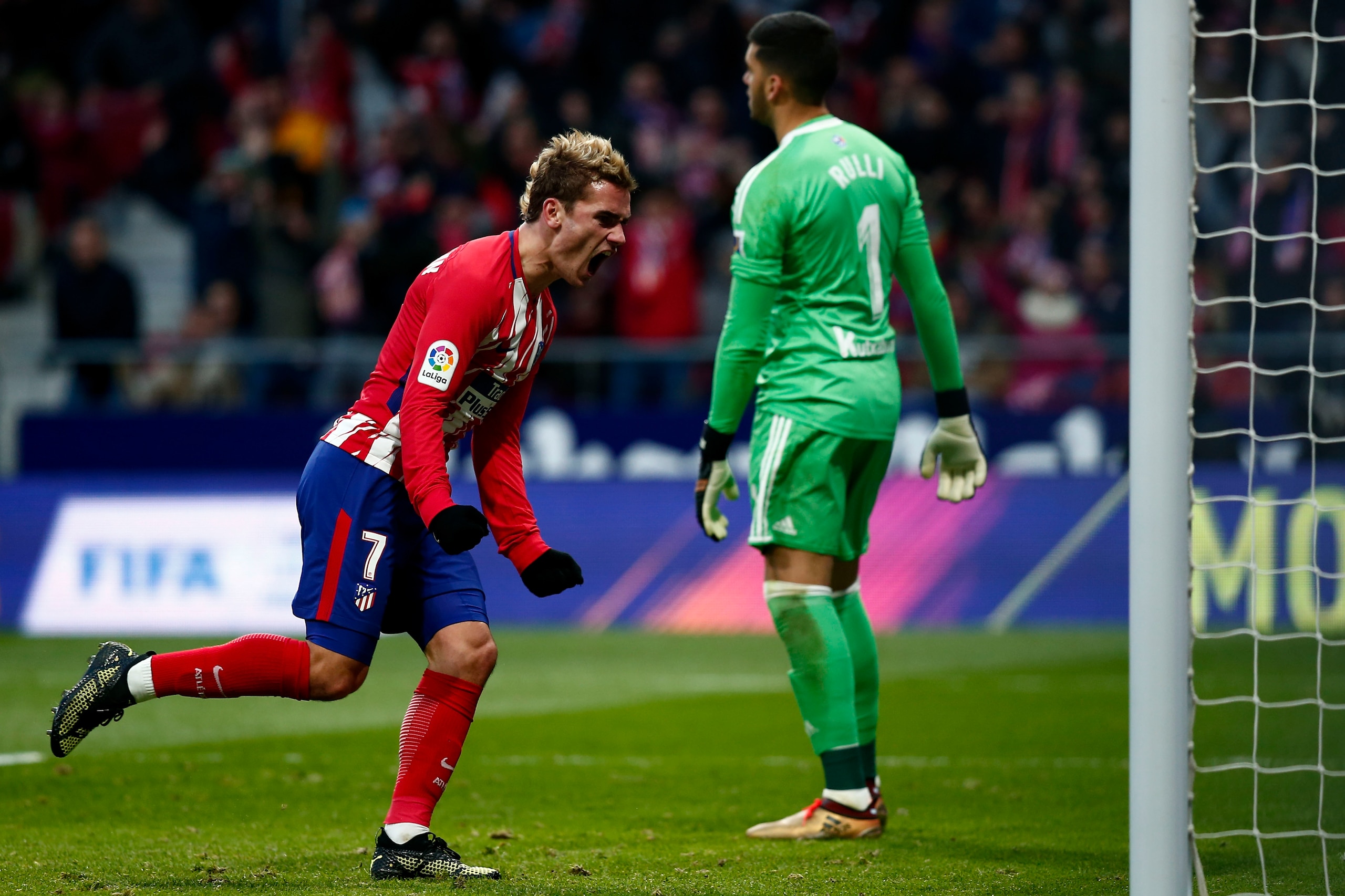 MADRID, SPAIN - DECEMBER 02: Antoine Griezmann of Atletico de Madrid celebrates his teammate Filipe Luis' goal during the La Liga match between Club Atletico Madrid and Real Sociedad de Futbol at Estadio Wanda Metropolitano on December 2, 2017 in Madrid, MADRID, SPAIN - DECEMBER 02: Antoine Griezmann of Atletico de Madrid celebrates his teammate Filipe Luis' goal during the La Liga match between Club Atletico Madrid and Real Sociedad de Futbol at Estadio Wanda Metropolitano on December 2, 2017 in Madrid,