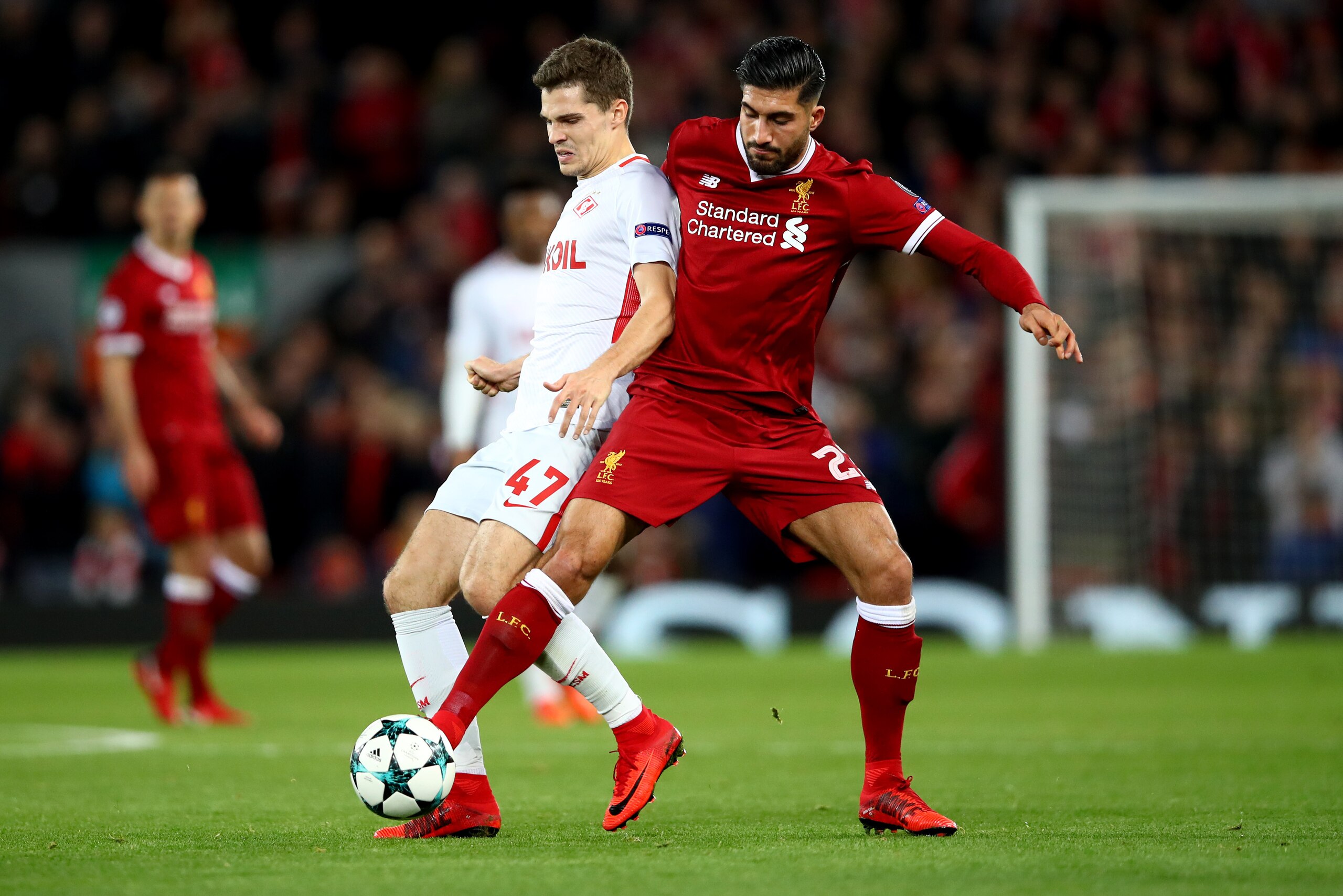 LIVERPOOL, ENGLAND - DECEMBER 06: Roman Zobnin of Spartak Moskva is challenged by Emre Can of Liverpool during the UEFA Champions League group E match between Liverpool FC and Spartak Moskva at Anfield on December 6, 2017 in Liverpool, United Kingdom. ( LIVERPOOL, ENGLAND - DECEMBER 06: Roman Zobnin of Spartak Moskva is challenged by Emre Can of Liverpool during the UEFA Champions League group E match between Liverpool FC and Spartak Moskva at Anfield on December 6, 2017 in Liverpool, United Kingdom. (