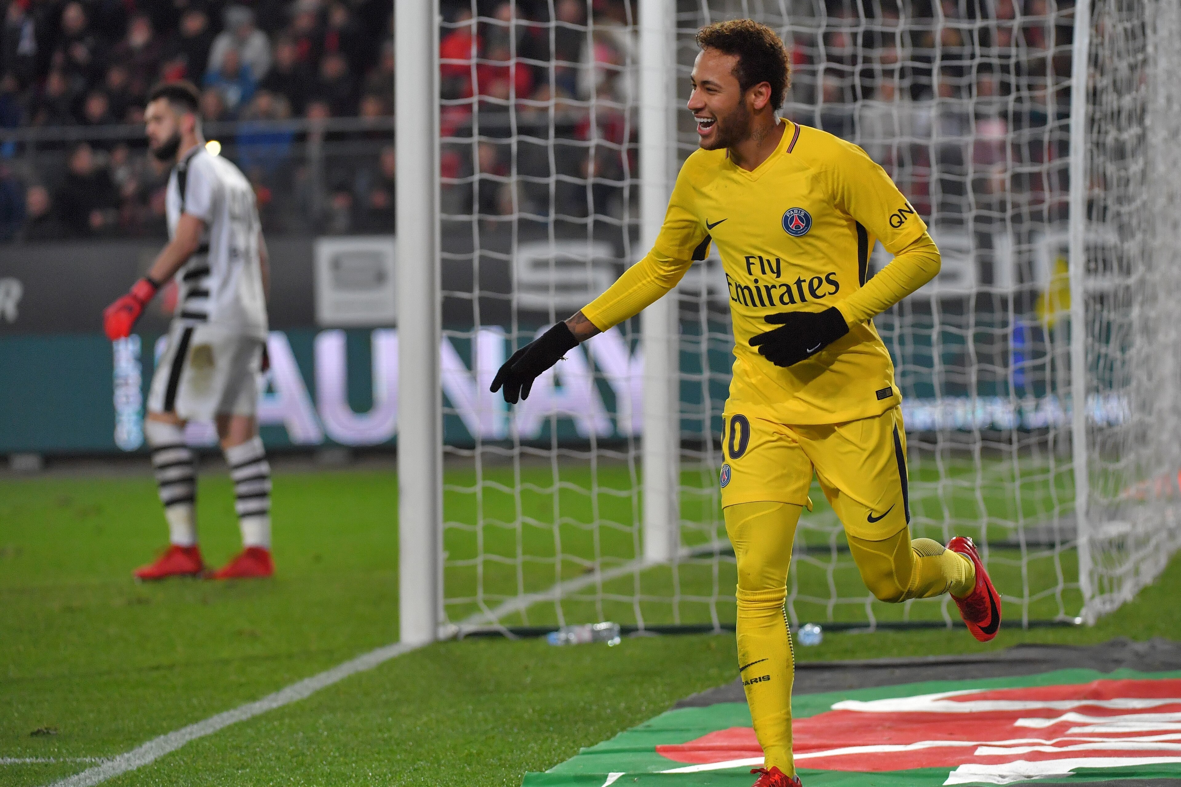 Paris Saint-Germain's Brazilian forward Neymar celebrates after scoring a goal during the French L1 football match between Rennes (Stade Rennais FC) and Paris Saint Germain (PSG), on December 16, 2017, at the Roazhon Park, in Rennes, northwestern France. 