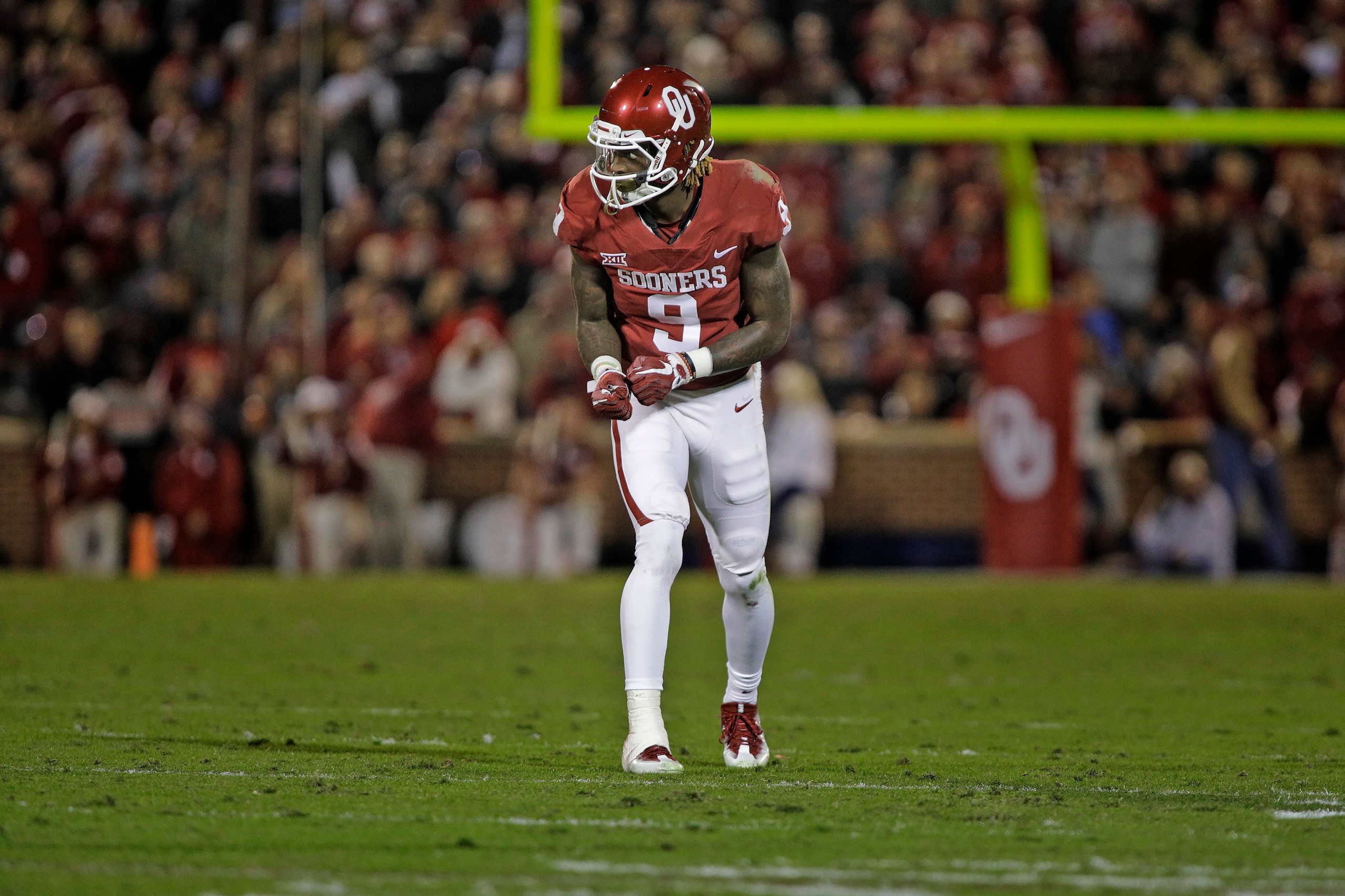 NORMAN, OK - OCTOBER 28: Wide receiver CeeDee Lamb #9 of the Oklahoma Sooners lines up for a play against the Texas Tech Red Raiders at Gaylord Family Oklahoma Memorial Stadium on October 28, 2017 in Norman, Oklahoma. Oklahoma defeated Texas Tech 49-27. (