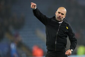 LEICESTER, ENGLAND - DECEMBER 19: Pep Guardiola the head coach / manager of Manchester City celebrates during the Carabao Cup Quarter-Final match between here Leicester City v Manchester City at The King Power Stadium on December 19, 2017 in Leicester, En