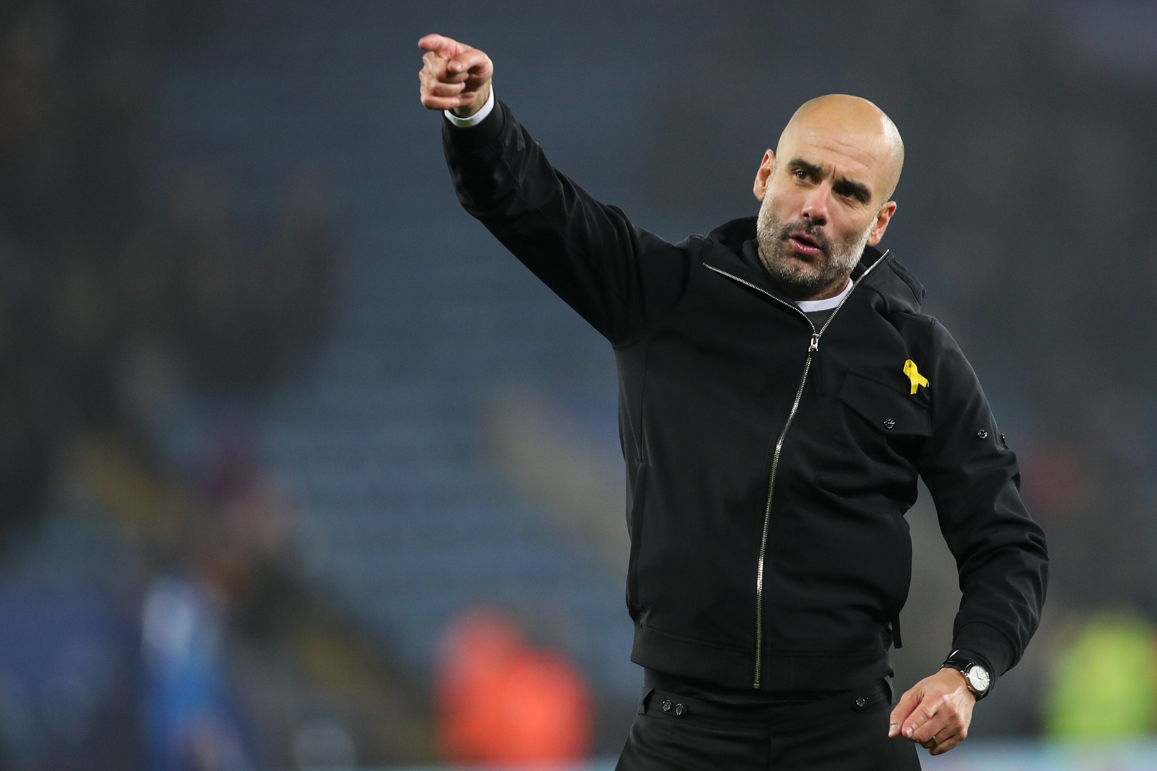 LEICESTER, ENGLAND - DECEMBER 19: Pep Guardiola the head coach / manager of Manchester City celebrates during the Carabao Cup Quarter-Final match between here Leicester City v Manchester City at The King Power Stadium on December 19, 2017 in Leicester, En