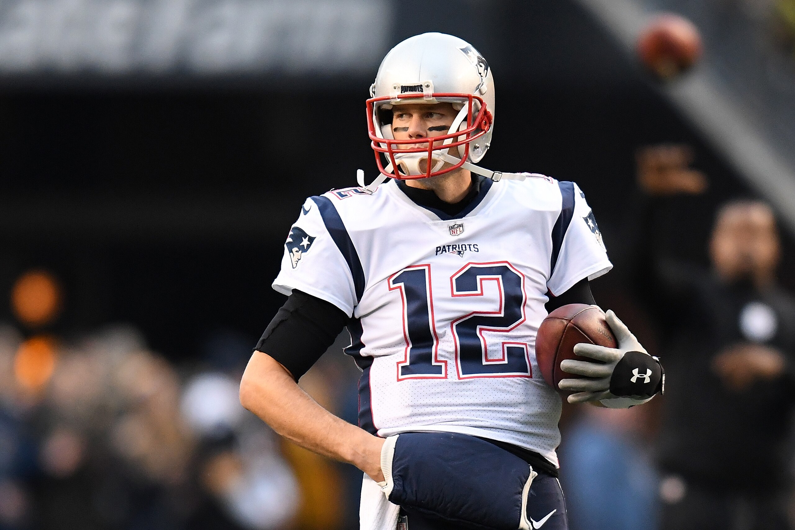 PITTSBURGH, PA - DECEMBER 17: Tom Brady #12 of the New England Patriots warms up prior to the game against the Pittsburgh Steelers at Heinz Field on December 17, 2017 in Pittsburgh, Pennsylvania. (Photo by Joe Sargent/Getty Images) *** Local Caption *** PITTSBURGH, PA - DECEMBER 17: Tom Brady #12 of the New England Patriots warms up prior to the game against the Pittsburgh Steelers at Heinz Field on December 17, 2017 in Pittsburgh, Pennsylvania. (Photo by Joe Sargent/Getty Images) *** Local Caption ***