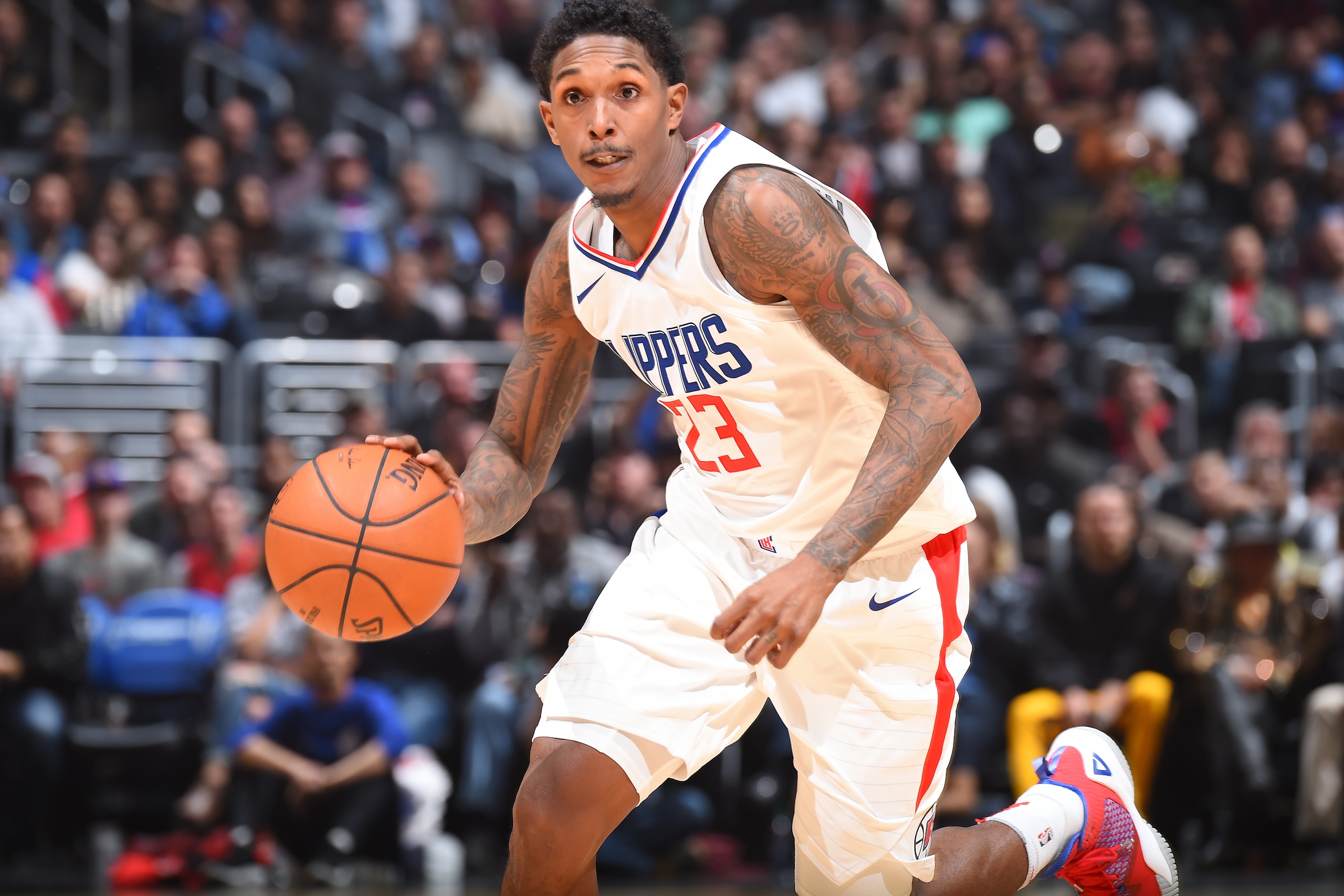 LOS ANGELES, CA - DECEMBER 11:  Lou Williams #23 of the LA Clippers handles the ball against the Toronto Raptors on December 11, 2017 at STAPLES Center in Los Angeles, California. NOTE TO USER: User expressly acknowledges and agrees that, by downloading a