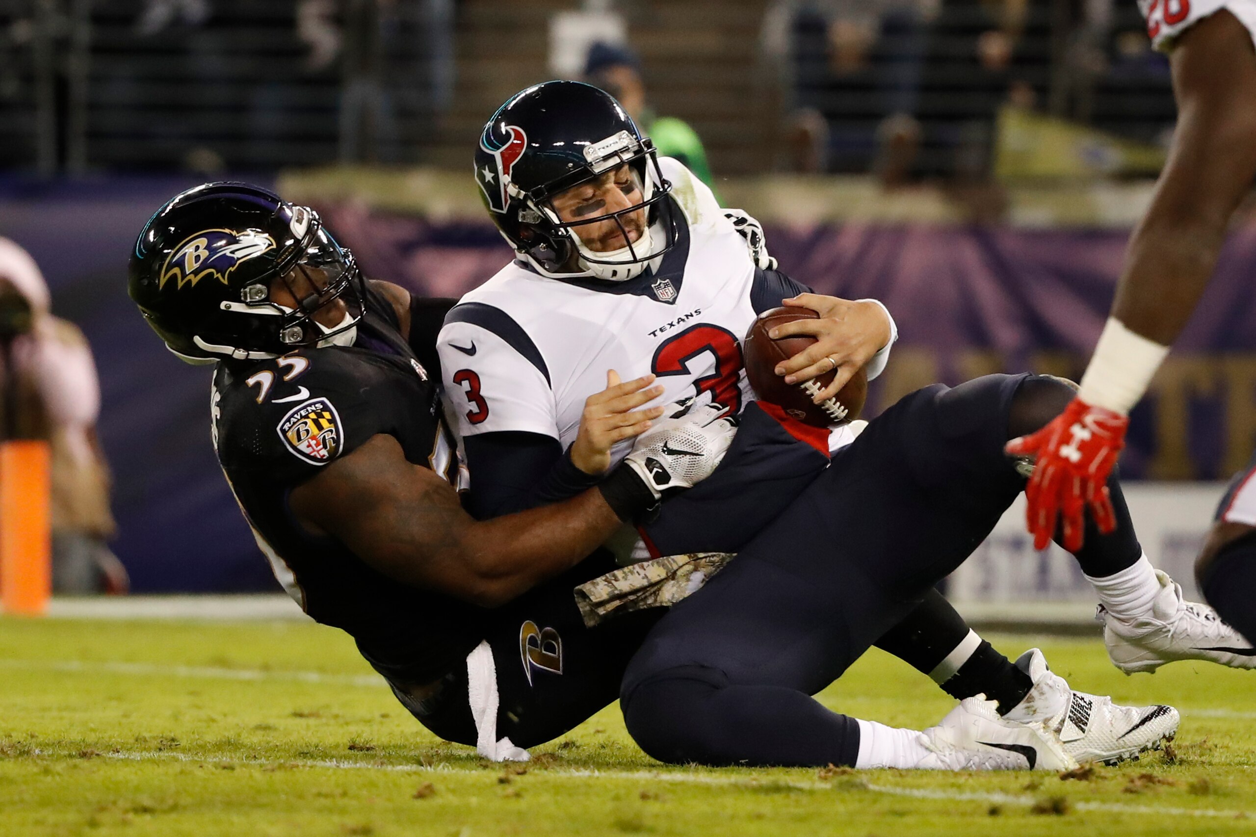 BALTIMORE, MD - NOVEMBER 27: Quarterback Tom Savage #3 of the Houston Texans is sacked by outside linebacker Terrell Suggs #55 of the Baltimore Ravens in the second quarter at M&T Bank Stadium on November 27, 2017 in Baltimore, Maryland. (Photo by Scott T BALTIMORE, MD - NOVEMBER 27: Quarterback Tom Savage #3 of the Houston Texans is sacked by outside linebacker Terrell Suggs #55 of the Baltimore Ravens in the second quarter at M&T Bank Stadium on November 27, 2017 in Baltimore, Maryland. (Photo by Scott T