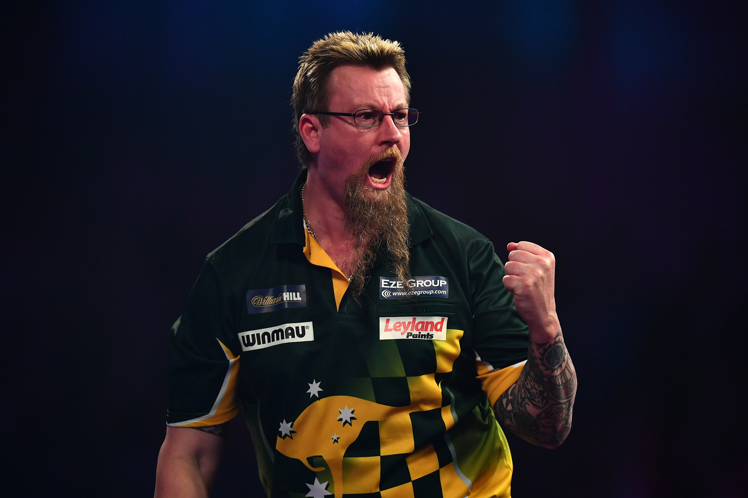 LONDON, ENGLAND - DECEMBER 20:  Simon Whitlock of Australia celebrates during the first round match against Dragutin Horvat of Germany on day six of the 2017 William Hill PDC World Darts Championships at Alexandra Palace on December 20, 2016 in London, En