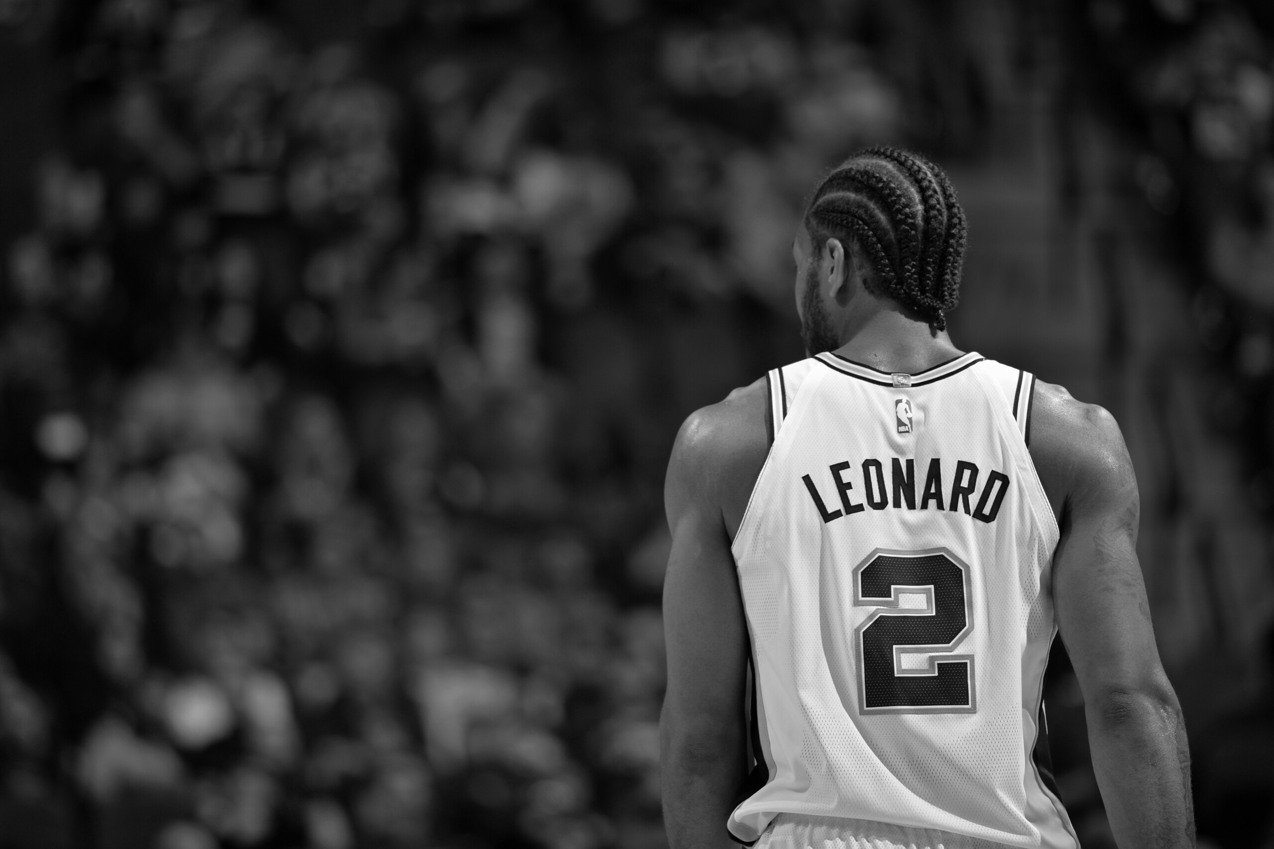 SAN ANTONIO, TX - DECEMBER 18:(EDITORS NOTE: Image has been converted to black and white.) A shot of Kawhi Leonard #2 of the San Antonio Spurs during the game against the LA Clippers on December 18, 2017 at the AT&T Center in San Antonio, Texas. NOTE TO U SAN ANTONIO, TX - DECEMBER 18:(EDITORS NOTE: Image has been converted to black and white.) A shot of Kawhi Leonard #2 of the San Antonio Spurs during the game against the LA Clippers on December 18, 2017 at the AT&T Center in San Antonio, Texas. NOTE TO U