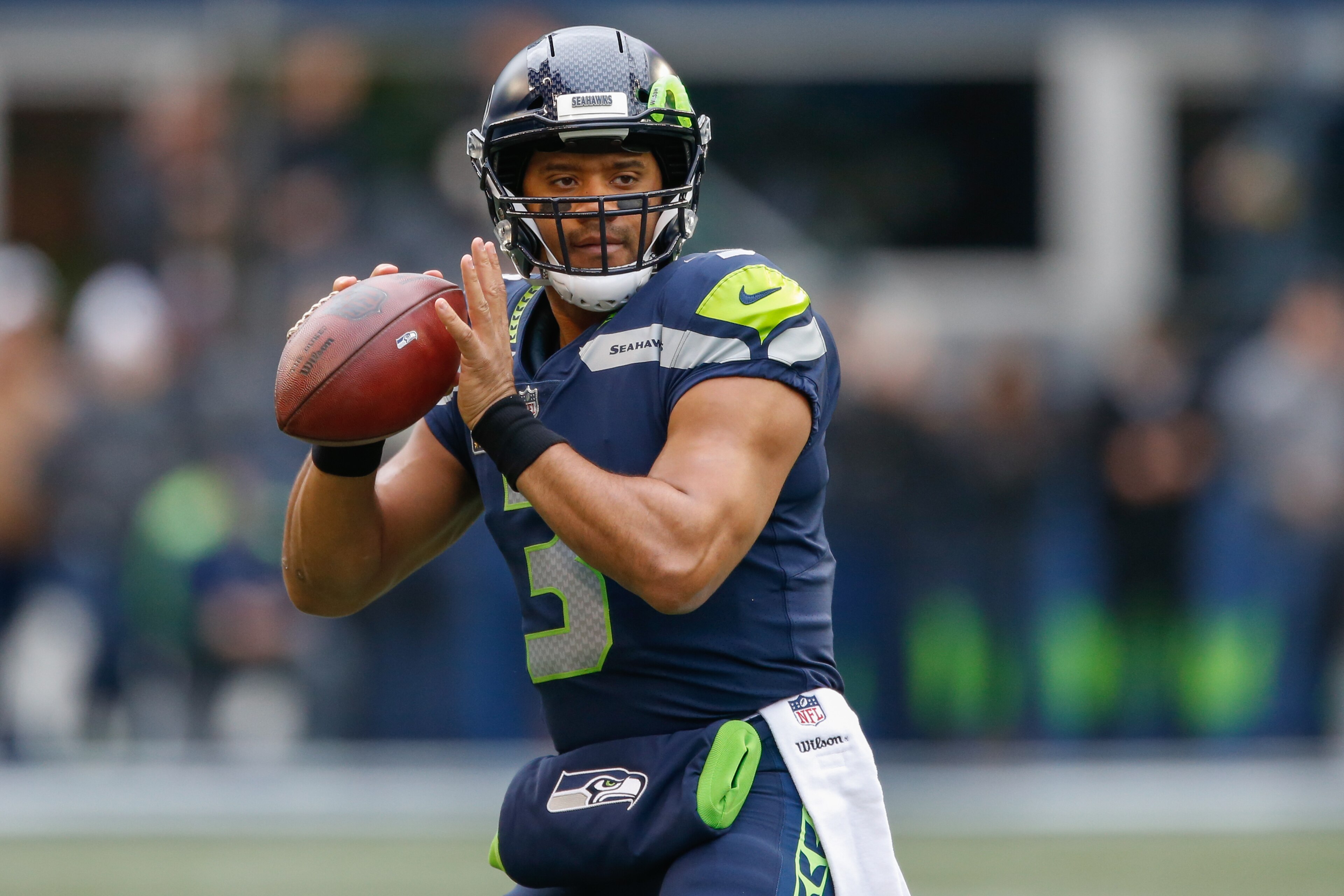 SEATTLE, WA - DECEMBER 17: Quarterback Russell Wilson #3 of the Seattle Seahawks warms up prior to the game against the Los Angeles Rams at CenturyLink Field on December 17, 2017 in Seattle, Washington. (Photo by Otto Greule Jr/Getty Images) SEATTLE, WA - DECEMBER 17: Quarterback Russell Wilson #3 of the Seattle Seahawks warms up prior to the game against the Los Angeles Rams at CenturyLink Field on December 17, 2017 in Seattle, Washington. (Photo by Otto Greule Jr/Getty Images)