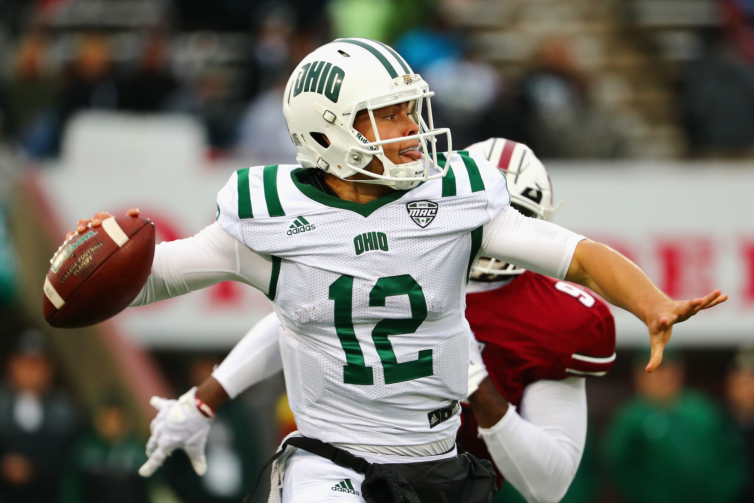 HADLEY, MA - SEPTEMBER 30: Nathan Rourke #12 of the Ohio Bobcats throws a pass during the first half against the Massachusetts Minutemen at Warren McGuirk Alumni Stadium on September 30, 2017 in Hadley, Massachusetts. (Photo by Tim Bradbury/Getty Images HADLEY, MA - SEPTEMBER 30: Nathan Rourke #12 of the Ohio Bobcats throws a pass during the first half against the Massachusetts Minutemen at Warren McGuirk Alumni Stadium on September 30, 2017 in Hadley, Massachusetts. (Photo by Tim Bradbury/Getty Images