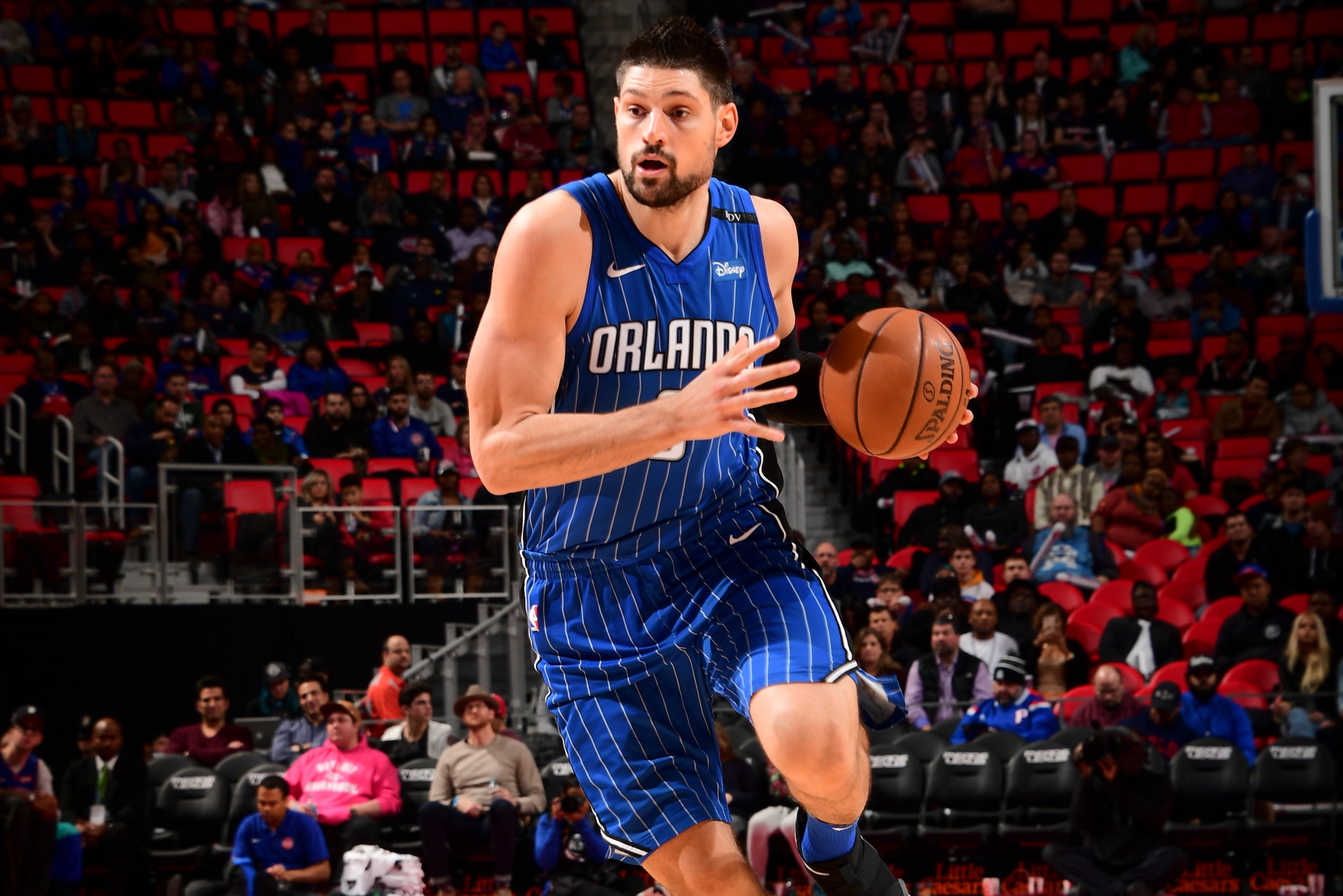 DETROIT, MI - DECEMBER 17: Nikola Vucevic #9 of the Orlando Magic handles the ball against the Detroit Pistons on December 17, 2017 at Little Caesars Arena in Detroit, Michigan. NOTE TO USER: User expressly acknowledges and agrees that, by downloading and