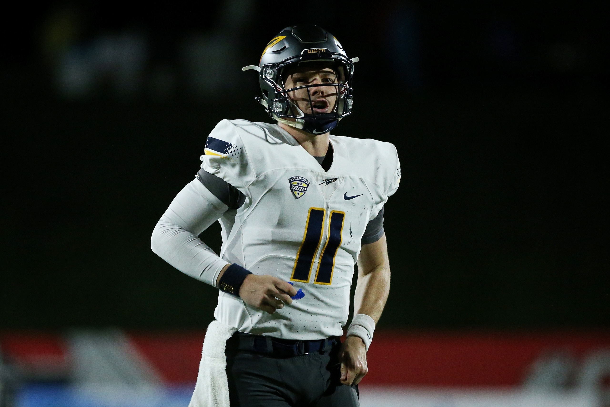 MUNCIE, IN - OCTOBER 26:  Logan Woodside #11 of the Toledo Rockets stands on the field in the third quarter against the Ball State Cardinals at Scheumann Stadium on October 26, 2017 in Muncie, Indiana. (Photo by Dylan Buell/Getty Images)