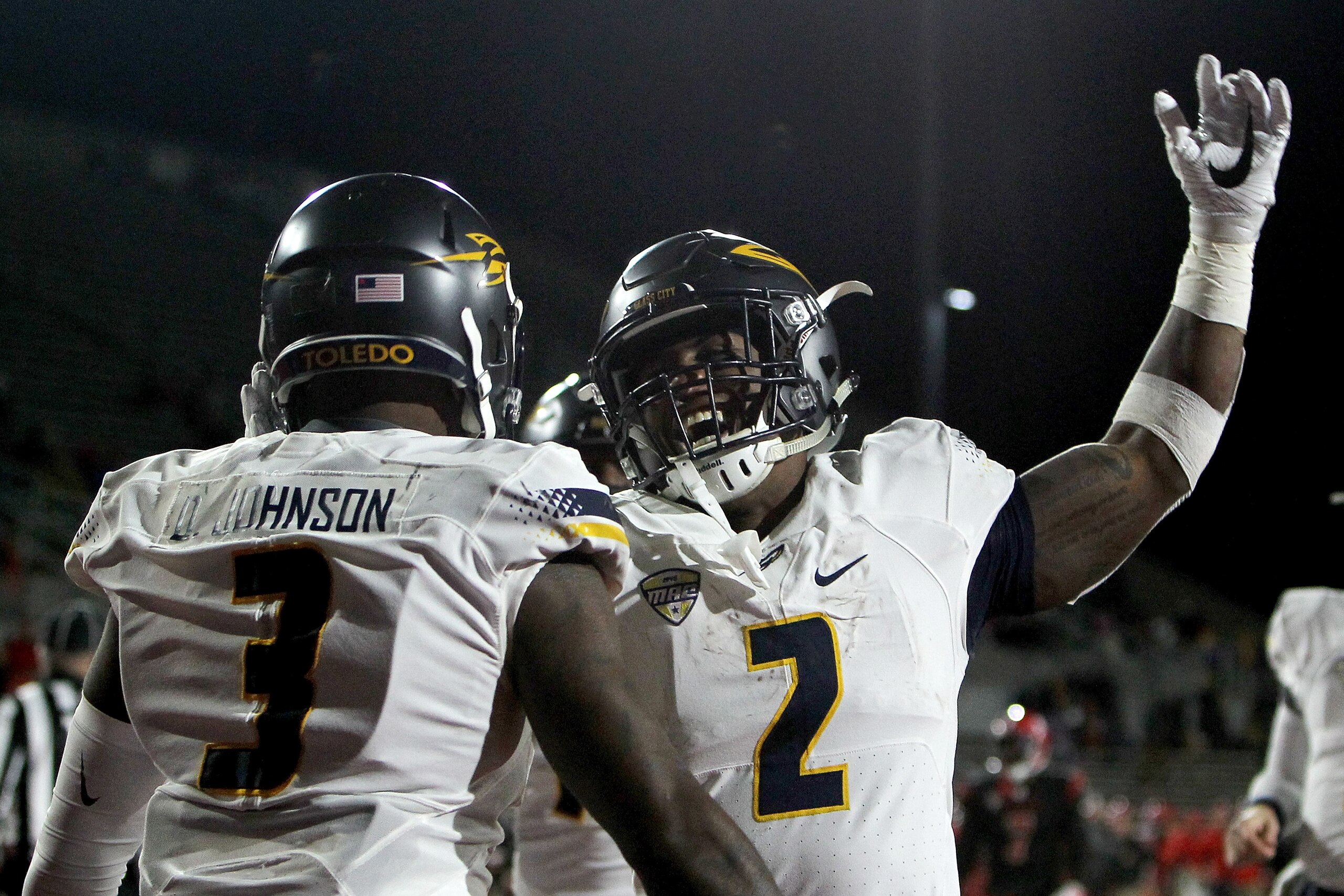 MUNCIE, IN - OCTOBER 26:  Diontae Johnson #3 and Terry Swanson #2 of the Toledo Rockets celebrate after scoring a touchdown in the third quarter against the Ball State Cardinals at Scheumann Stadium on October 26, 2017 in Muncie, Indiana. (Photo by Dylan 