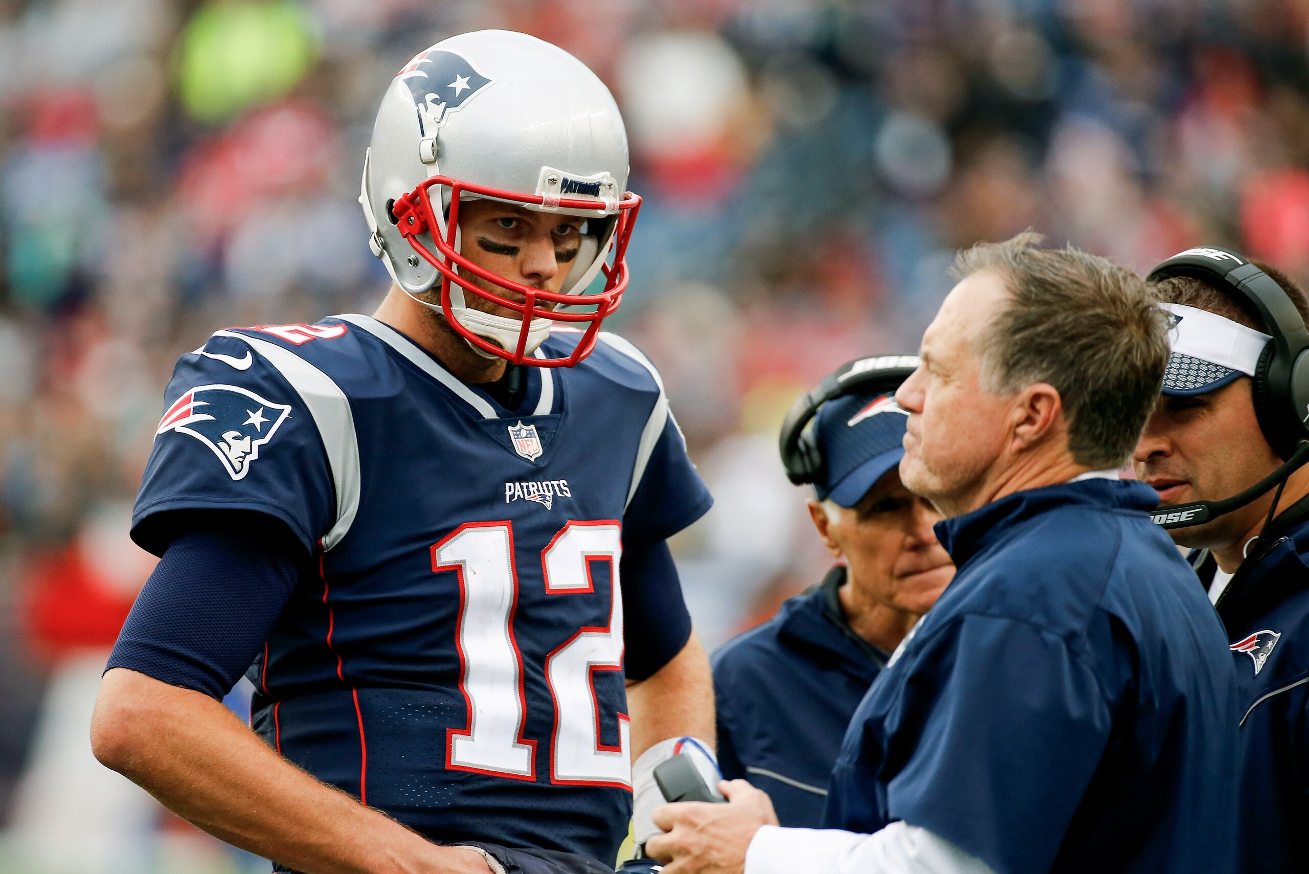 FOXBORO, MA - OCTOBER 29:  Head coach Bill Belichick of the New England Patriots talks with Tom Brady #12 during the fourth quarter of a game against the Los Angeles Chargers at Gillette Stadium on October 29, 2017 in Foxboro, Massachusetts.  (Photo by Ji