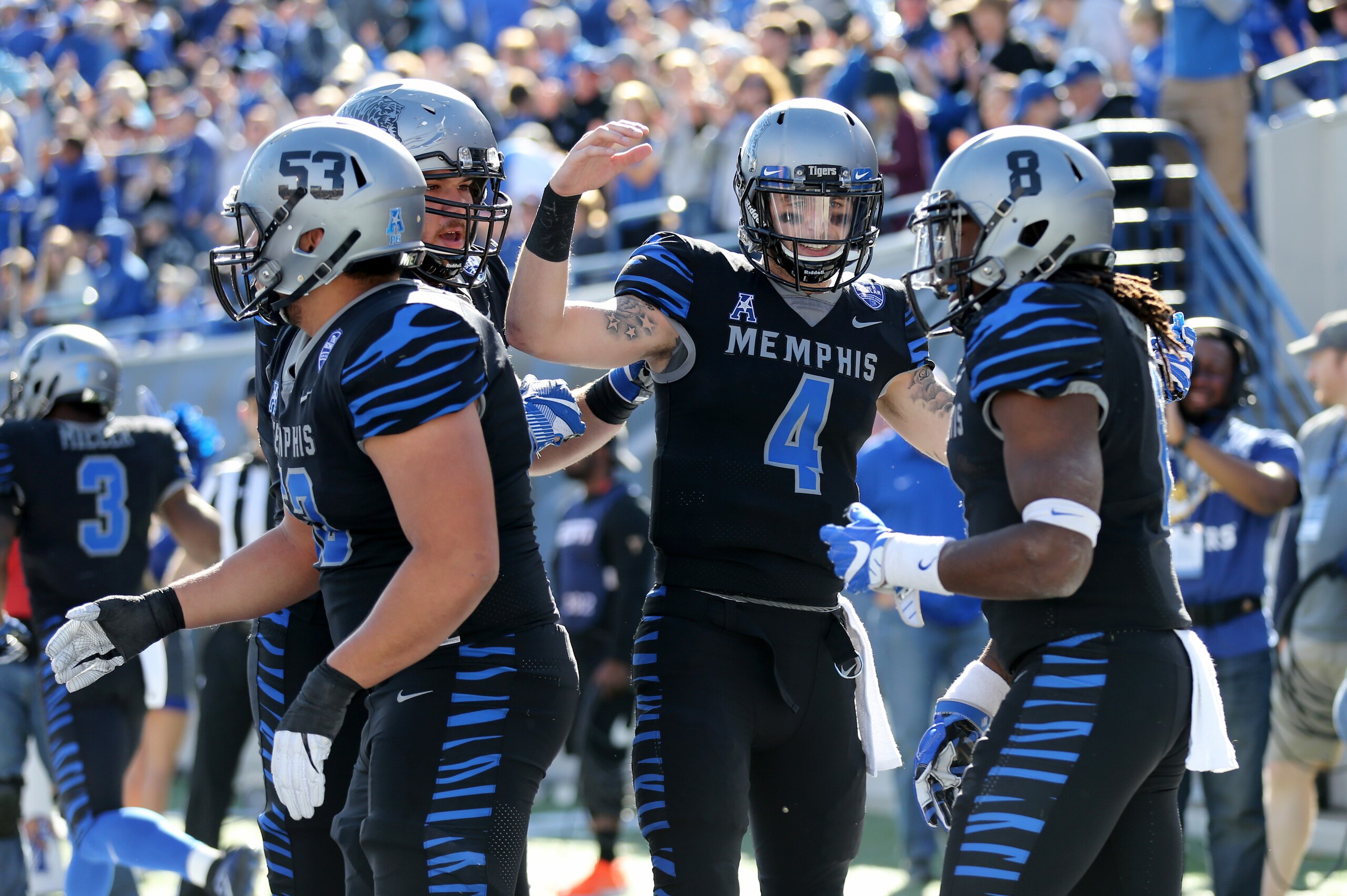 MEMPHIS, TN - NOVEMBER 25: Riley Ferguson #4 and Darrell Henderson #8 of the Memphis Tigers celebrate a touchdown against the East Carolina Pirates on November 25, 2017 at Liberty Bowl Memorial Stadium in Memphis, Tennessee. (Photo by Joe Murphy/Getty Ima