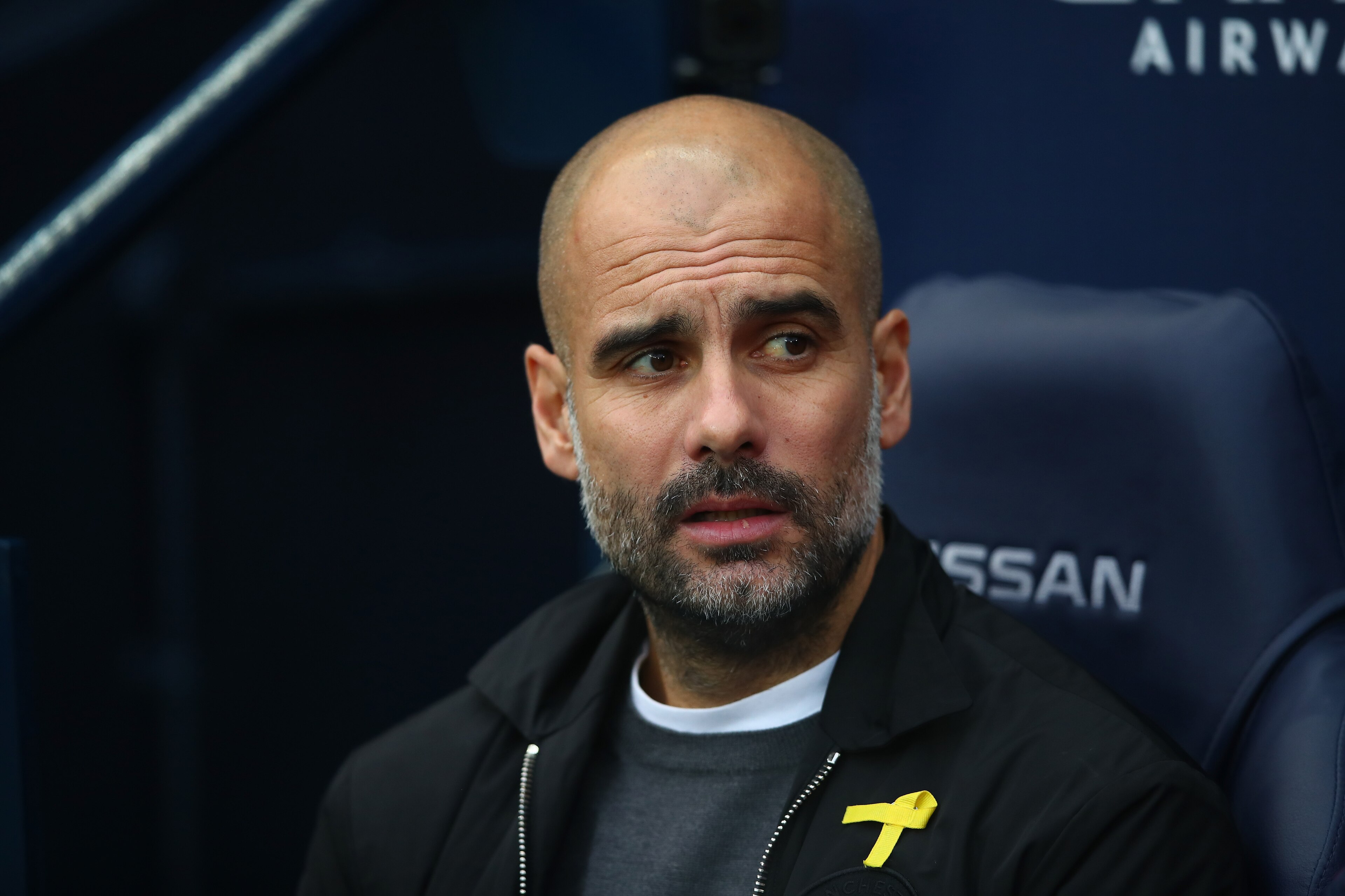 MANCHESTER, ENGLAND - DECEMBER 23:  Josep Guardiola, Manager of Manchester City looks on prior to the Premier League match between Manchester City and AFC Bournemouth at Etihad Stadium on December 23, 2017 in Manchester, England.  (Photo by Clive Brunskil