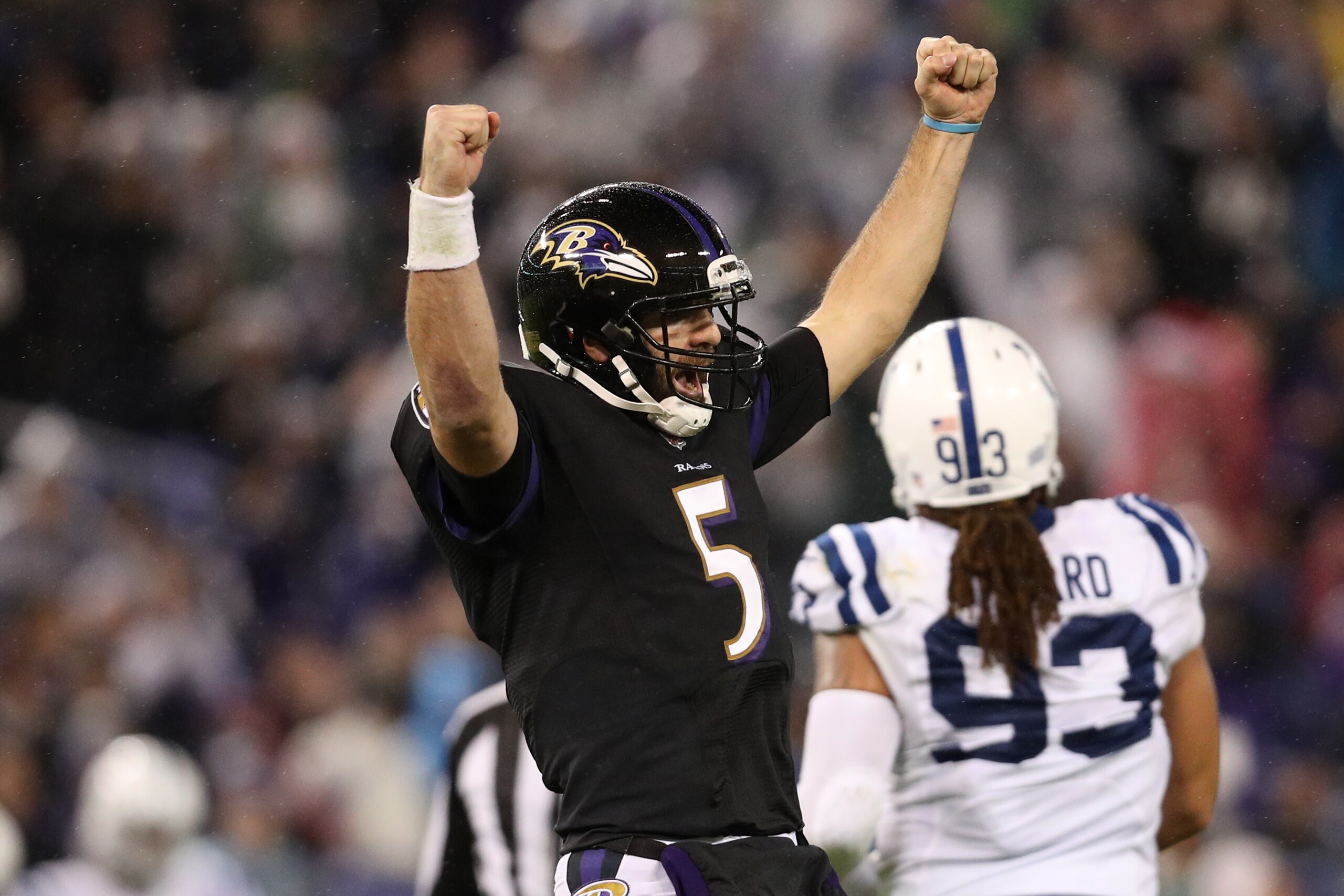 BALTIMORE, MD - DECEMBER 23: Quarterback Joe Flacco #5 of the Baltimore Ravens celebrates after a touchdown in the fourth quarter against the Indianapolis Colts at M&T Bank Stadium on December 23, 2017 in Baltimore, Maryland. (Photo by Patrick Smith/Getty