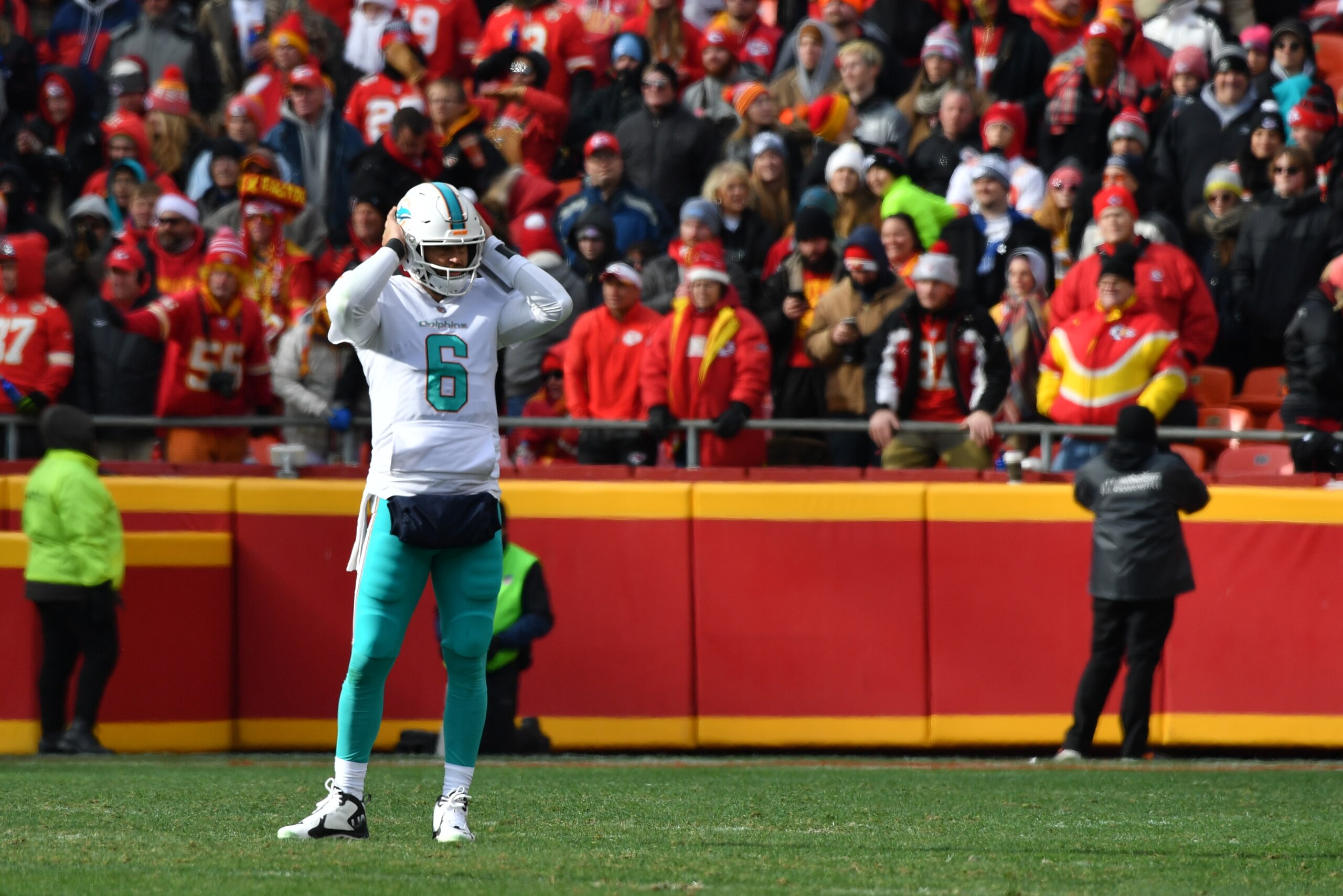 KANSAS CITY, MO - DECEMBER 24: Quarterback Jay Cutler #6 of the Miami Dolphins has trouble hearing the play call during the second quarter of the game against the Kansas City Chiefs at Arrowhead stadium on December 24, 2017 in Kansas City, Missouri. ( Pho