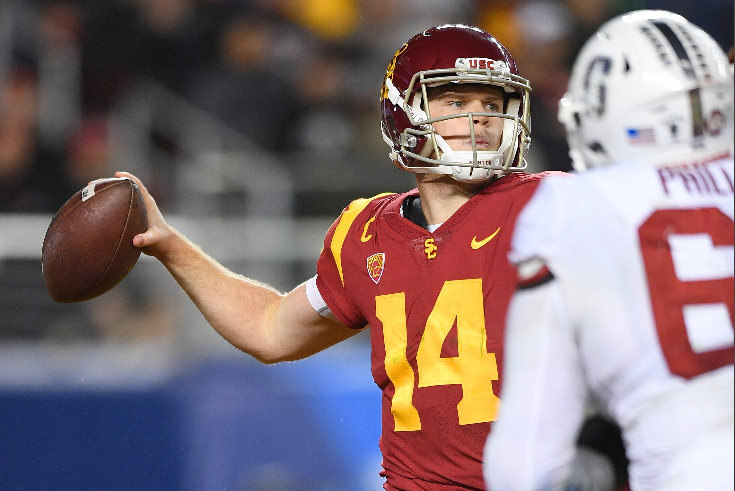 SANTA CLARA, CA - DECEMBER 01:  Sam Darnold #14 of the USC Trojans looks to throw a pass against the Stanford Cardinal during the Pac-12 Football Championship Game at Levi's Stadium on December 1, 2017 in Santa Clara, California.  (Photo by Thearon W. Hen