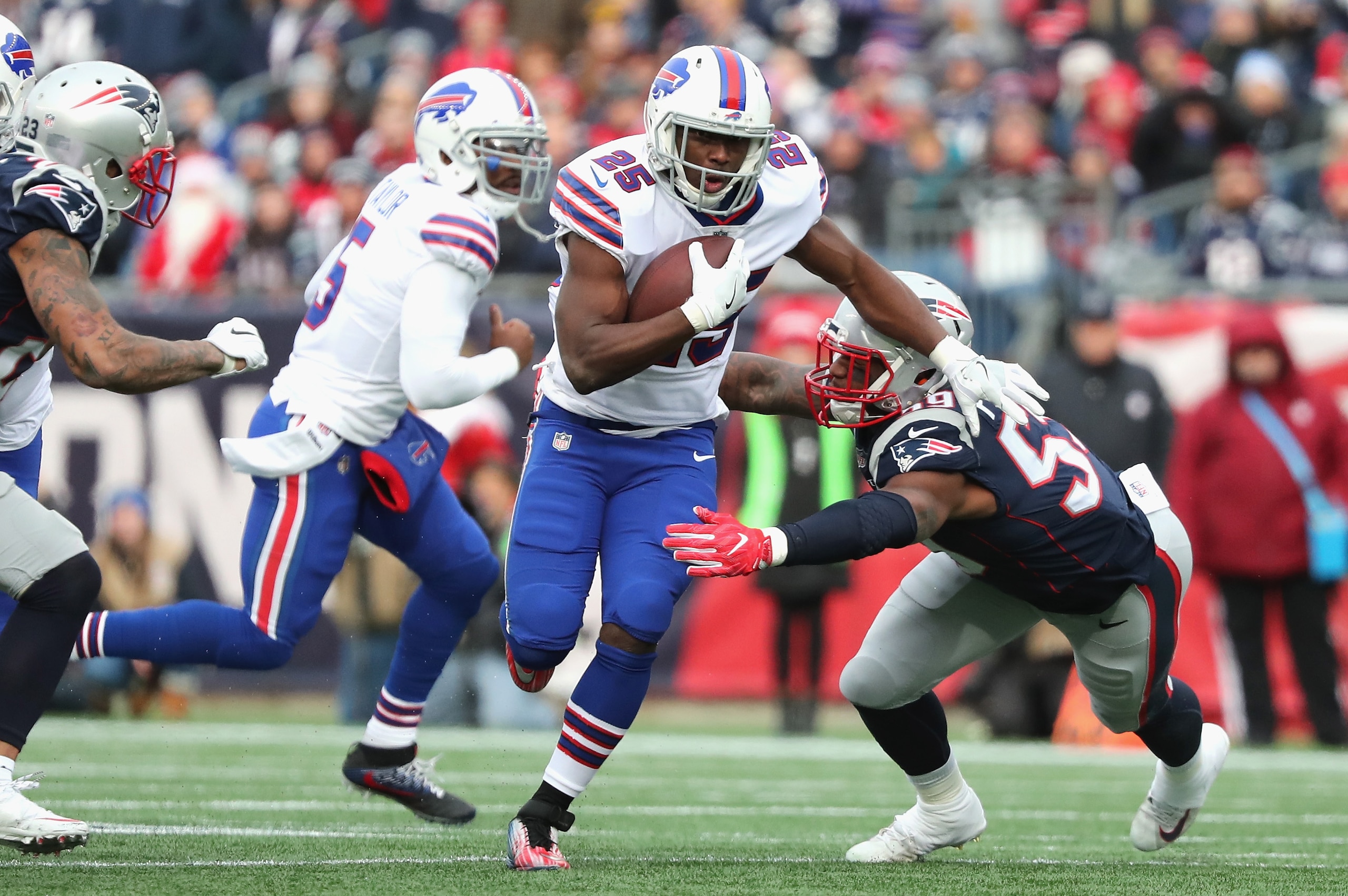 FOXBORO, MA- DECEMBER 24: LeSean McCoy #25 of the Buffalo Bills carries the ball during the first quarter of a game against the New England Patriots at Gillette Stadium on December 24, 2017 in Foxboro, Massachusetts. (Photo by Adam Glanzman/Getty Images) FOXBORO, MA- DECEMBER 24: LeSean McCoy #25 of the Buffalo Bills carries the ball during the first quarter of a game against the New England Patriots at Gillette Stadium on December 24, 2017 in Foxboro, Massachusetts. (Photo by Adam Glanzman/Getty Images)