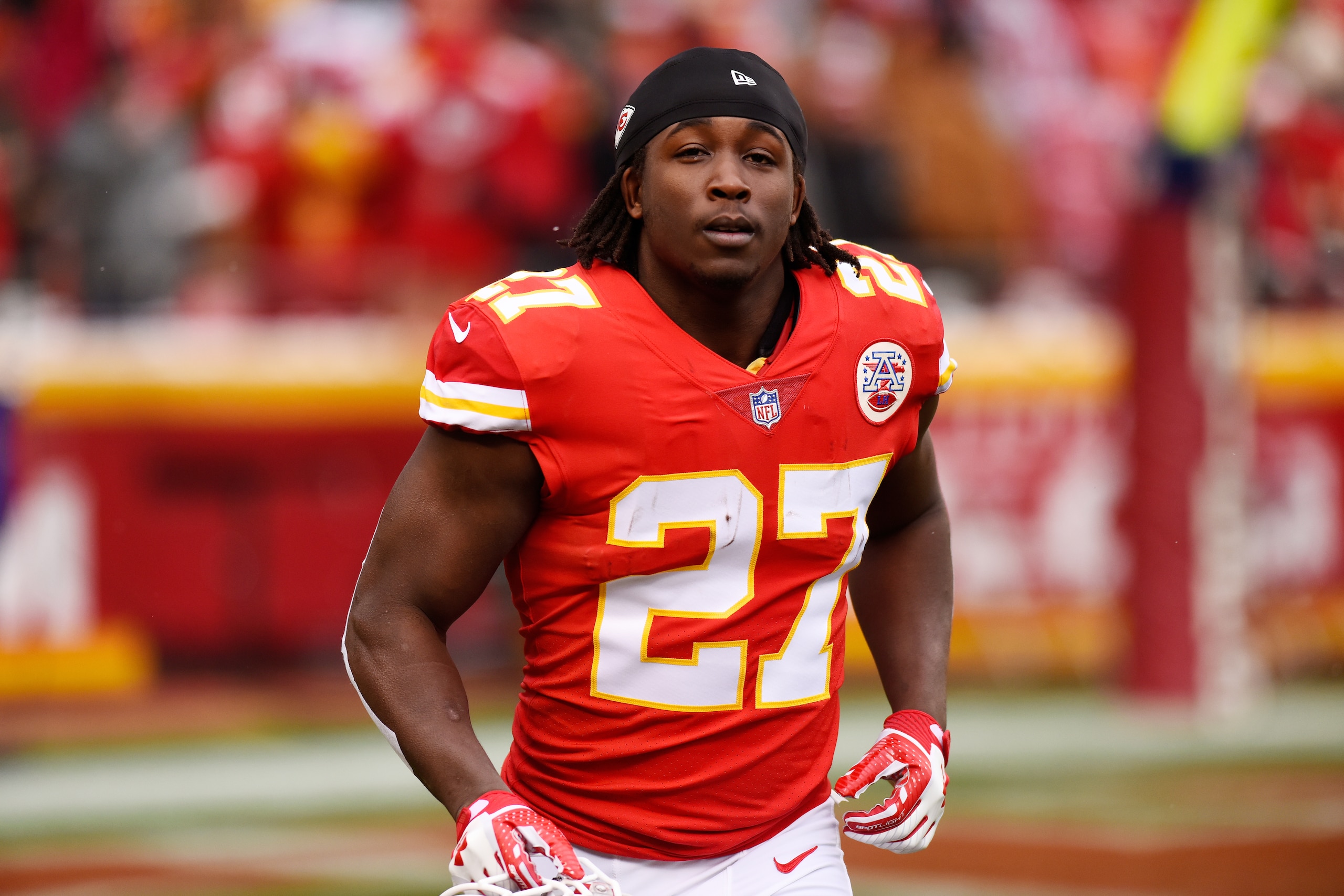 KANSAS CITY, MO - DECEMBER 24: Running back Kareem Hunt #27 of the Kansas City Chiefs runs to the sidelines just before kickoff in the game against the Miami Dolphins at Arrowhead Stadium on December 24, 2017 in Kansas City, Missouri. ( Photo by Jason Han KANSAS CITY, MO - DECEMBER 24: Running back Kareem Hunt #27 of the Kansas City Chiefs runs to the sidelines just before kickoff in the game against the Miami Dolphins at Arrowhead Stadium on December 24, 2017 in Kansas City, Missouri. ( Photo by Jason Han