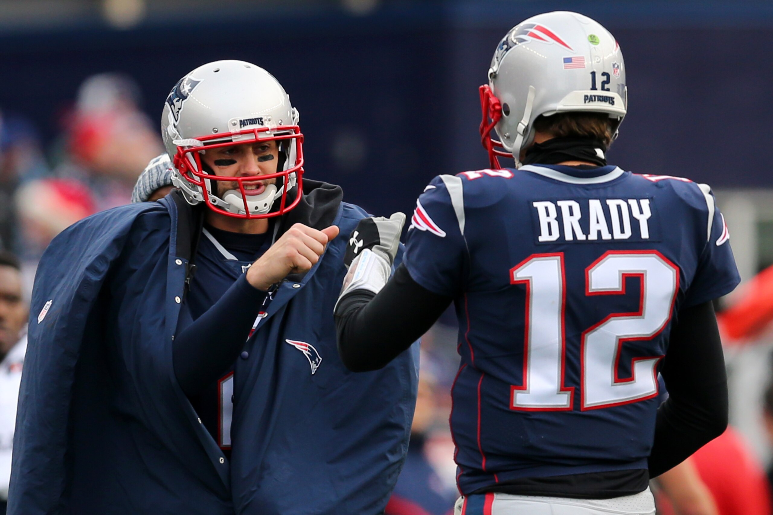 FOXBORO, MA - DECEMBER 24: Brian Hoyer #2 of the New England Patriots celebrates with Tom Brady #12 during the game against the Buffalo Bills at Gillette Stadium on December 24, 2017 in Foxboro, Massachusetts. (Photo by Maddie Meyer/Getty Images)