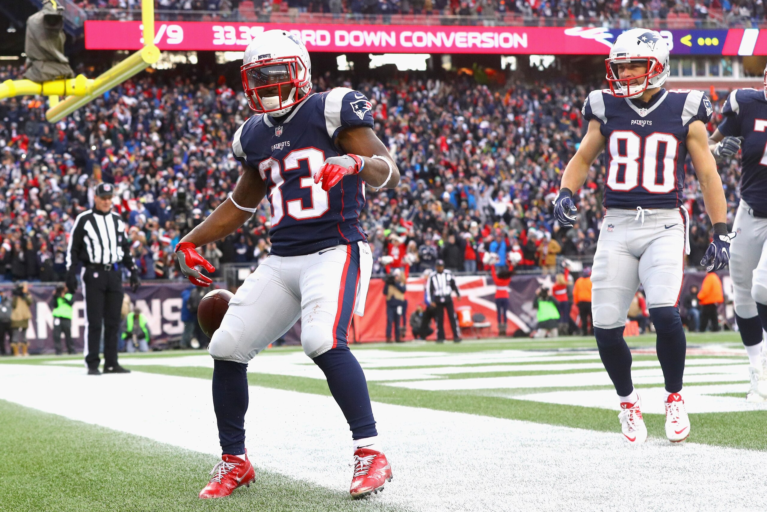 FOXBORO, MA - DECEMBER 24:  Dion Lewis #33 of the New England Patriots reacts after scoring a touchdown during the fourth quarter of a game against the Buffalo Bills at Gillette Stadium on December 24, 2017 in Foxboro, Massachusetts.  (Photo by Maddie Mey