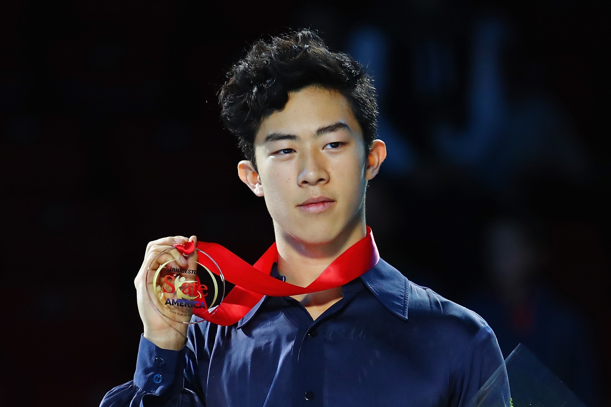 LAKE PLACID, NY - NOVEMBER 25:  Gold medalist Nathan Chen of the United States poses after competing in the Men's Free Skating during day two of 2017 Bridgestone Skate America at Herb Brooks Arena on November 25, 2017 in Lake Placid, New York.  (Photo by 