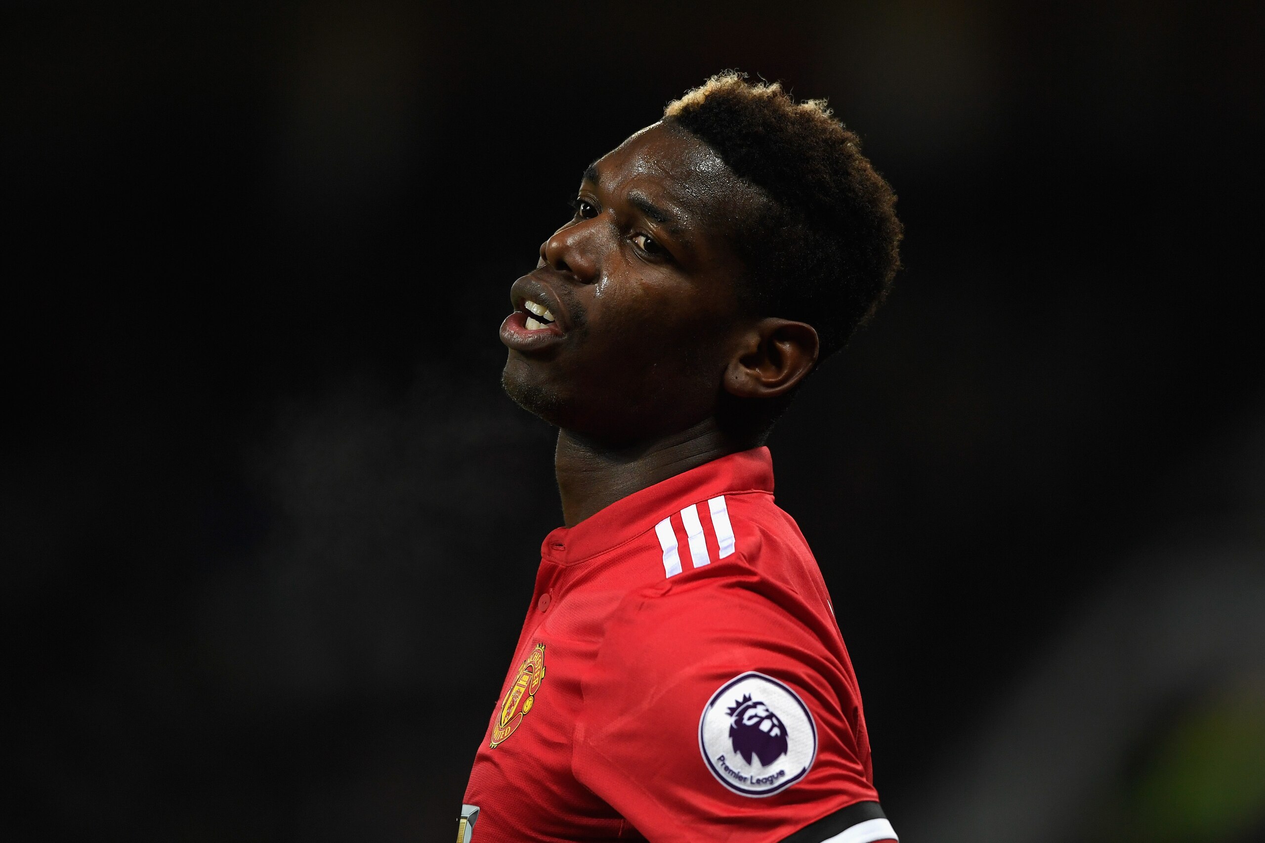 MANCHESTER, ENGLAND - DECEMBER 26:  United player Paul Pogba reacts during the Premier League match between Manchester United and Burnley at Old Trafford on December 26, 2017 in Manchester, England.  (Photo by Stu Forster/Getty Images)