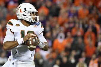 CHARLOTTE, NC - DECEMBER 02:  Malik Rosier #12 of the Miami Hurricanes drops back to pass against the Clemson Tigers during the ACC Football Championship at Bank of America Stadium on December 2, 2017 in Charlotte, North Carolina.  (Photo by Mike Comer/Ge