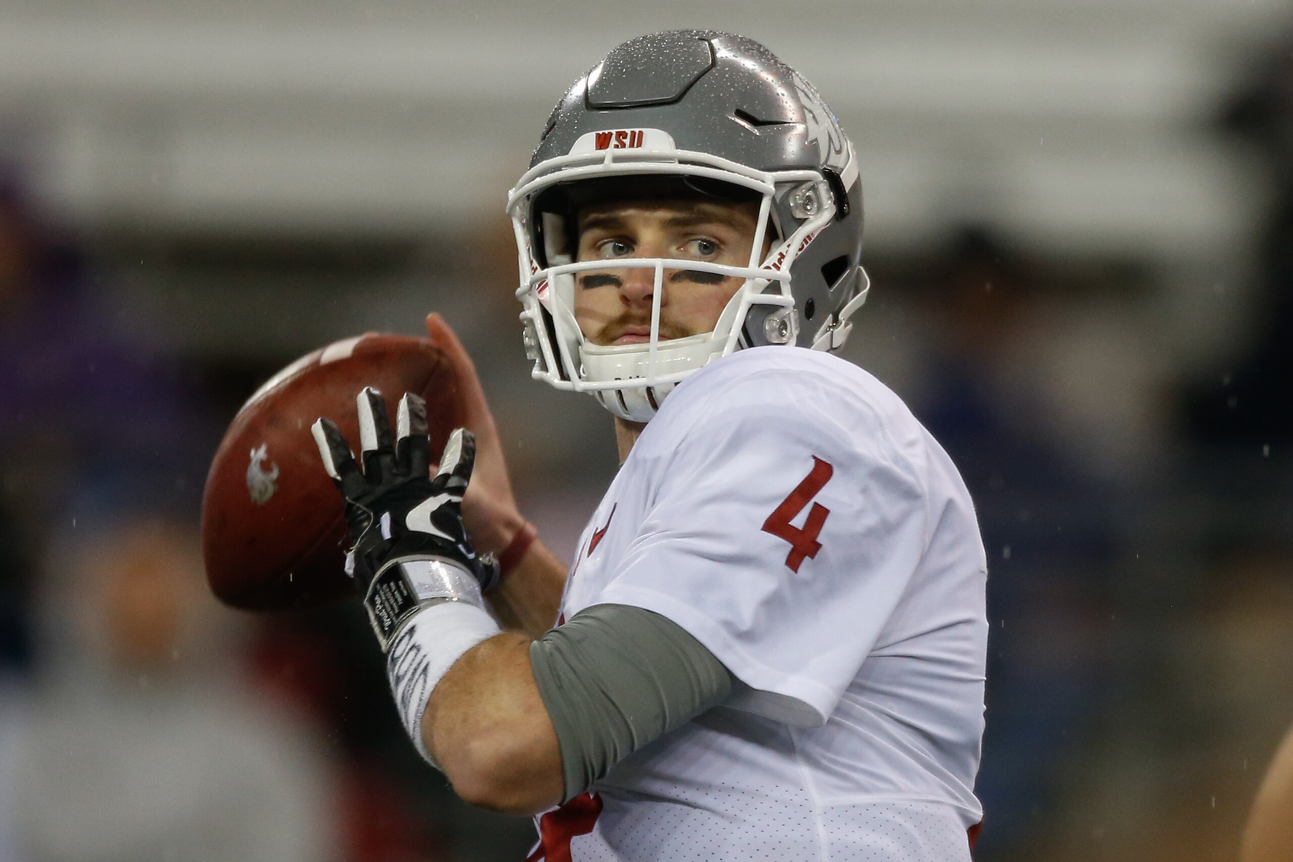 SEATTLE, WA - NOVEMBER 25:  Quarterback Luke Falk #4 of the Washington State Cougars warms up prior to the game against the Washington Huskies at Husky Stadium on November 25, 2017 in Seattle, Washington.  (Photo by Otto Greule Jr/Getty Images)