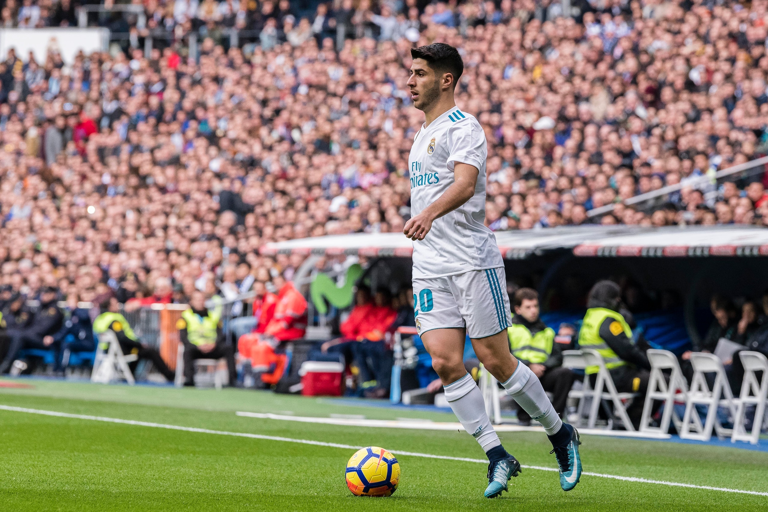 MADRID, SPAIN - DECEMBER 09: Marco Asensio of Real Madrid in action during the La Liga 2017-18 match between Real Madrid and Sevilla FC at Santiago Bernabeu Stadium on 09 December 2017 in Madrid, Spain. (Photo by Power Sport Images/Getty Images)